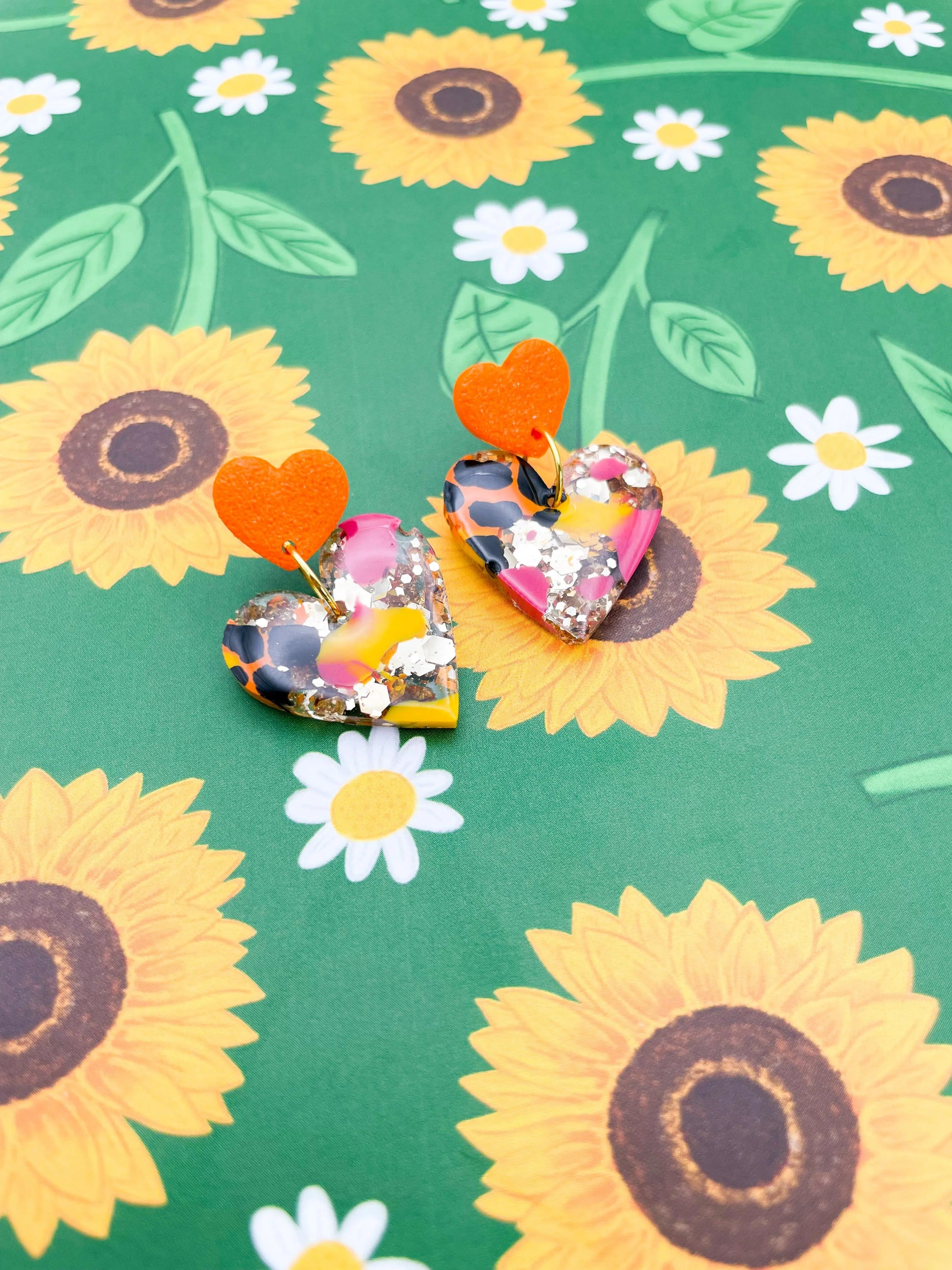 Hot Pink, Orange & Yellow Giraffe Print Gold Glitter Resin Heart Dangle Earrings from Sapphire Frills