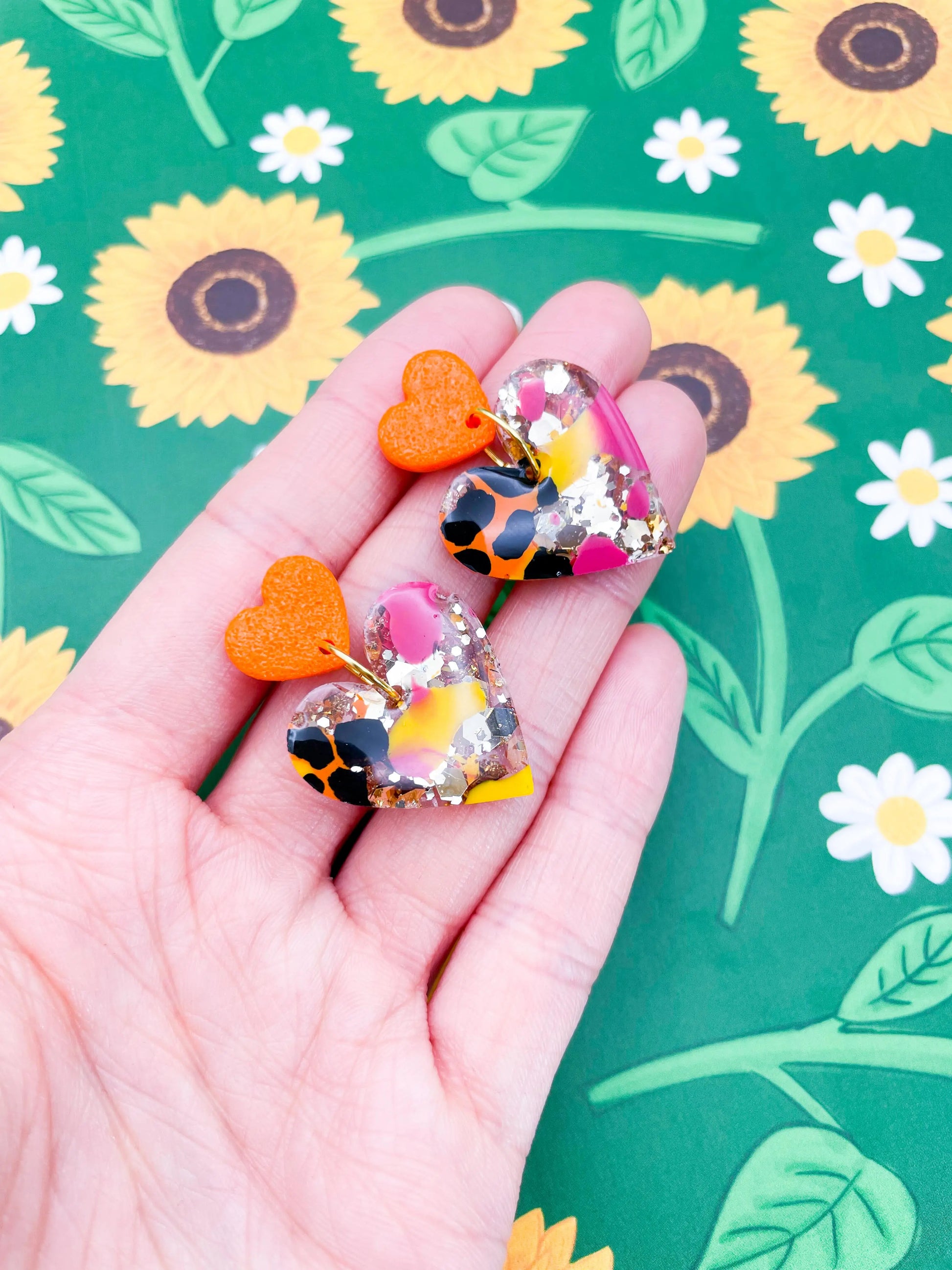 Hot Pink, Orange & Yellow Giraffe Print Gold Glitter Resin Heart Dangle Earrings from Sapphire Frills