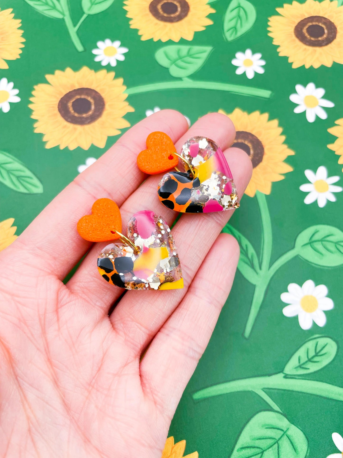 Hot Pink, Orange & Yellow Giraffe Print Gold Glitter Resin Heart Dangle Earrings from Sapphire Frills