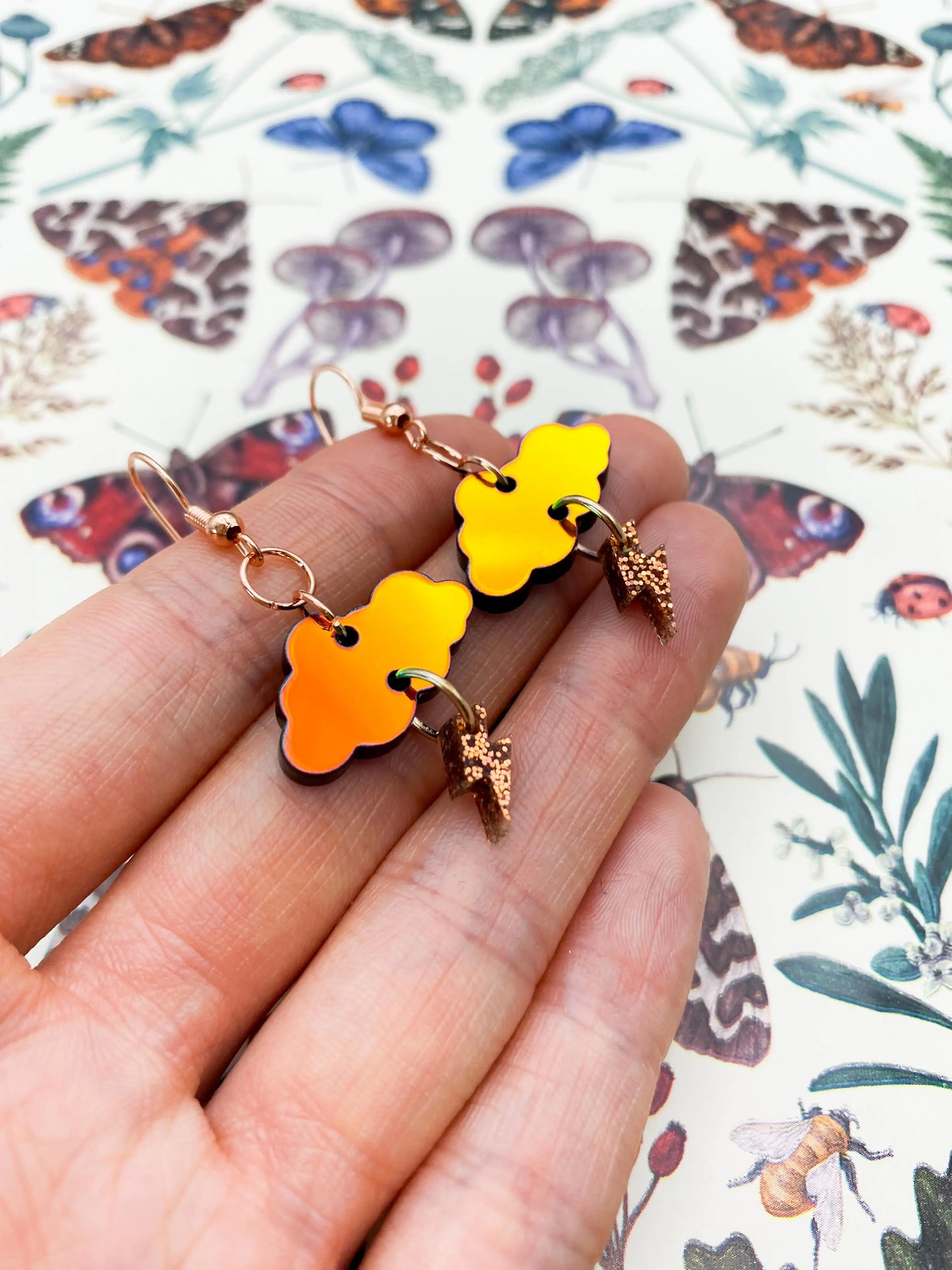Iridescent Orange and Copper Glitter Autumn Storm Small Cloud & Bolt Dangle Earrings from Sapphire Frills