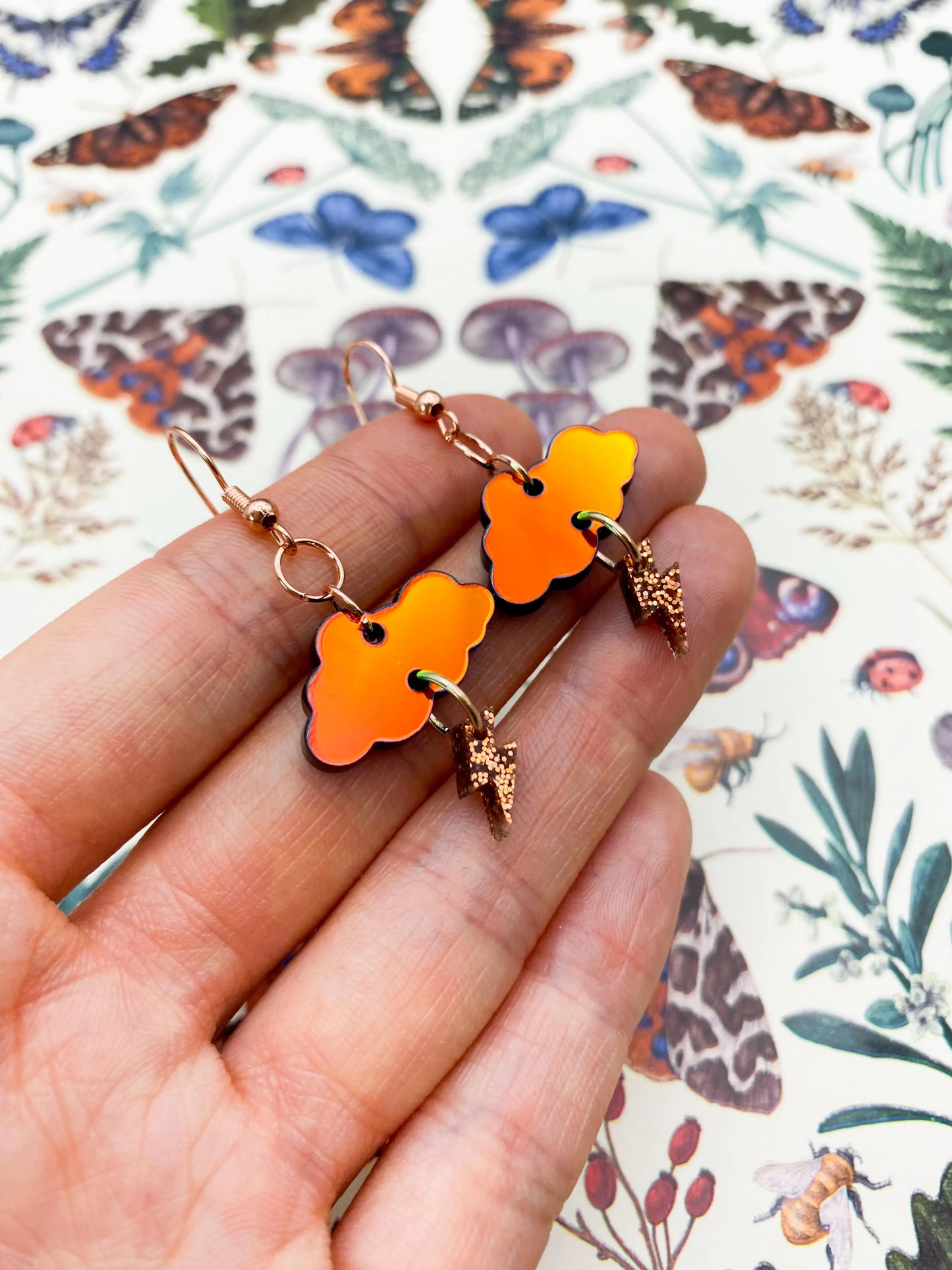 Iridescent Orange and Copper Glitter Autumn Storm Small Cloud & Bolt Dangle Earrings from Sapphire Frills
