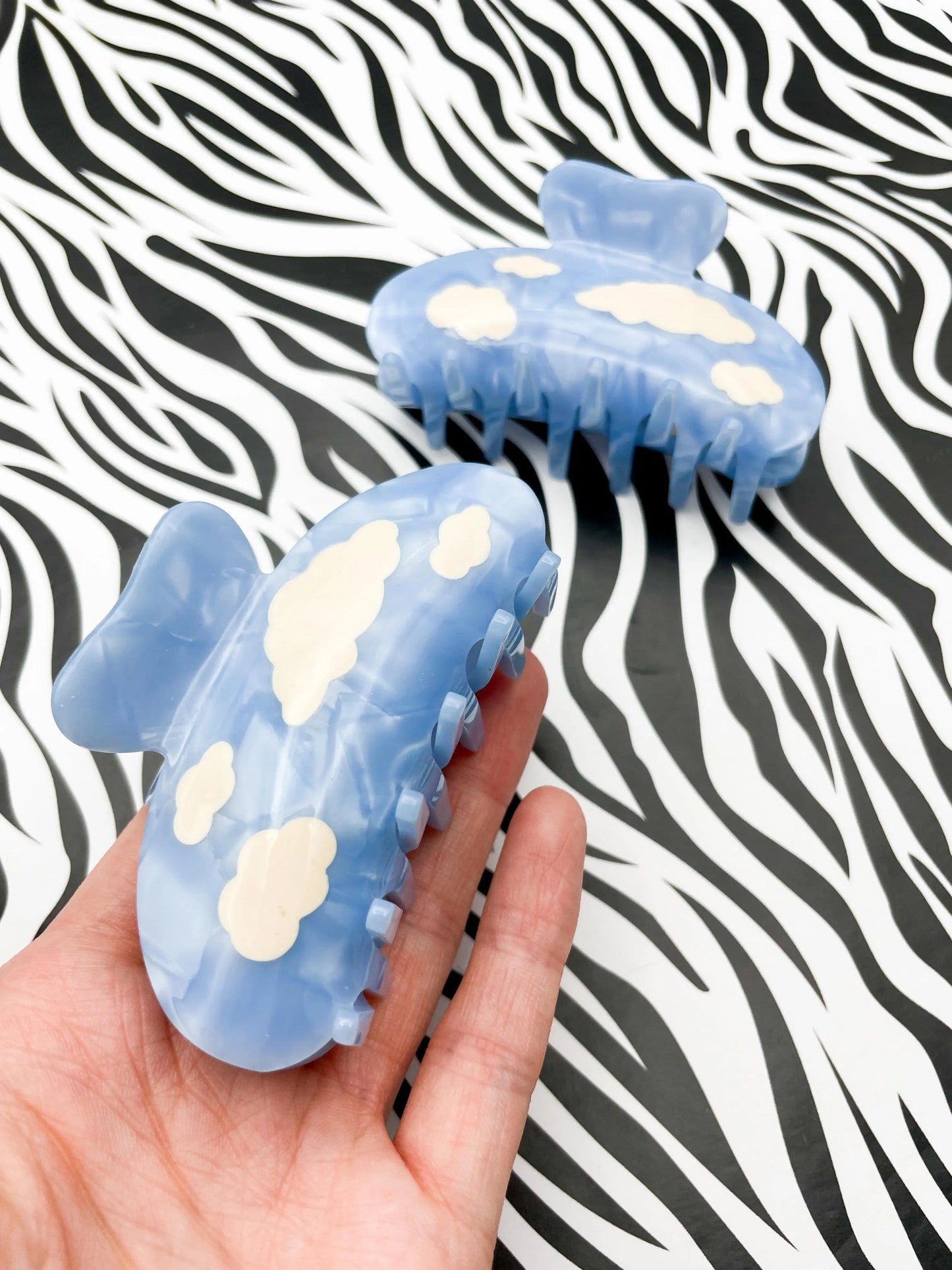 Medium Metallic Sky Blue Cloud Print Claw Hair Clip from Sapphire Frills