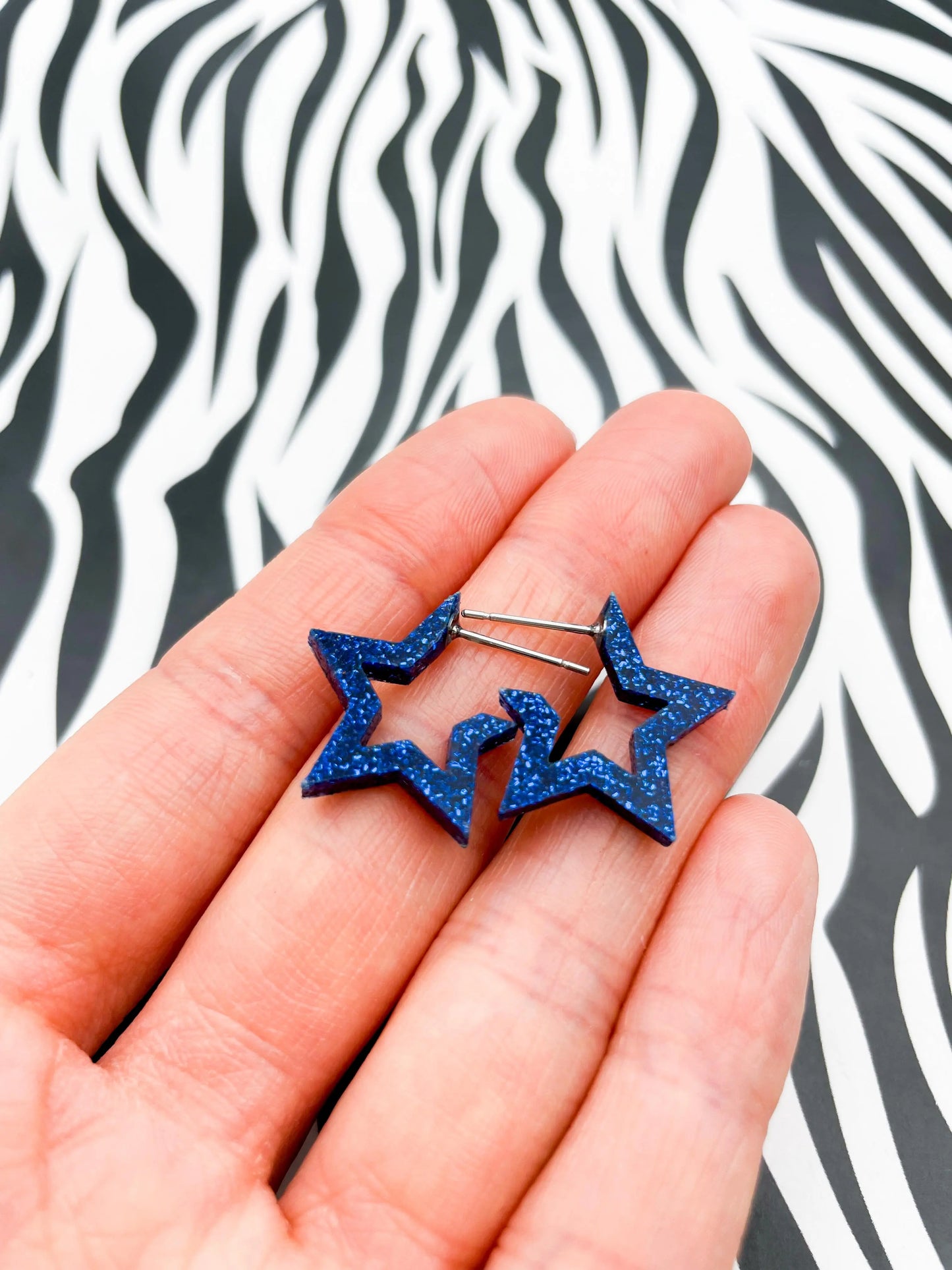 Medium Navy Blue Glitter Acrylic Star Hoops from Sapphire Frills