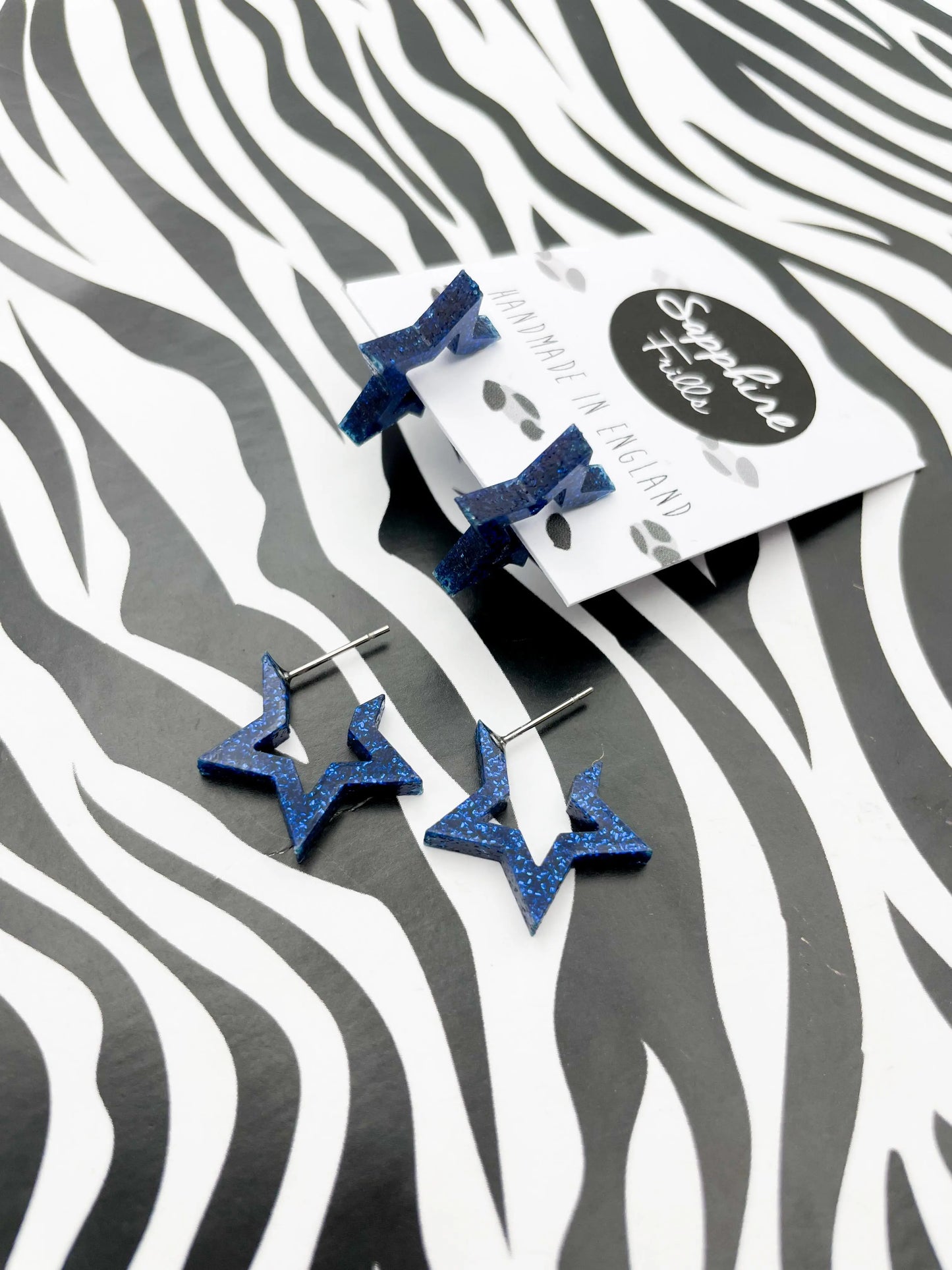 Medium Navy Blue Glitter Acrylic Star Hoops from Sapphire Frills
