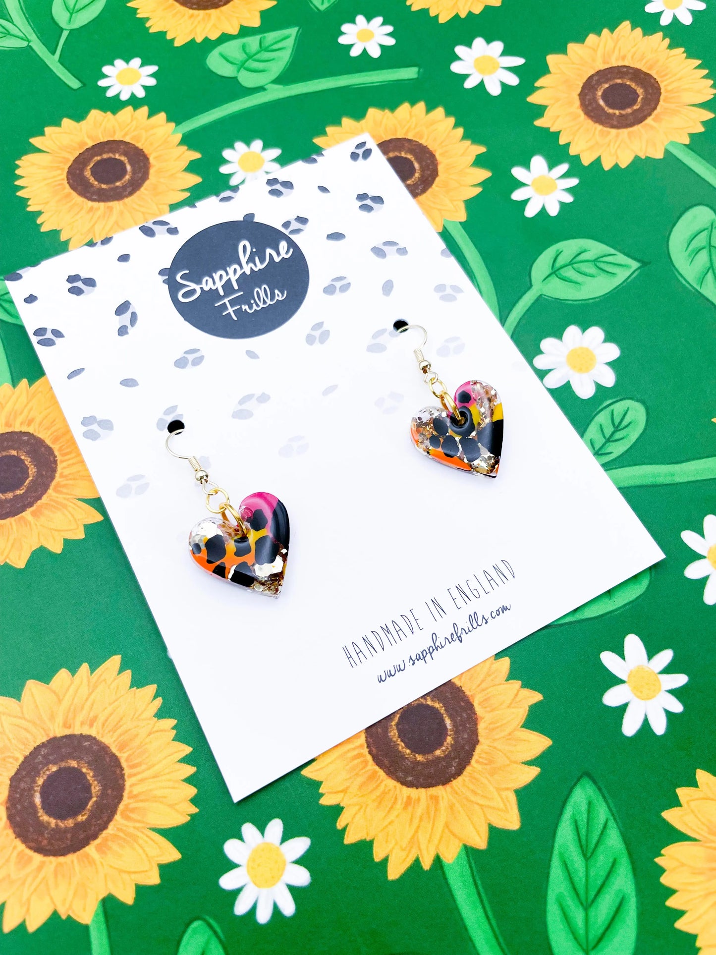 Medium Safari Giraffe Print Gold Glitter Resin Heart Stud Earrings from Sapphire Frills