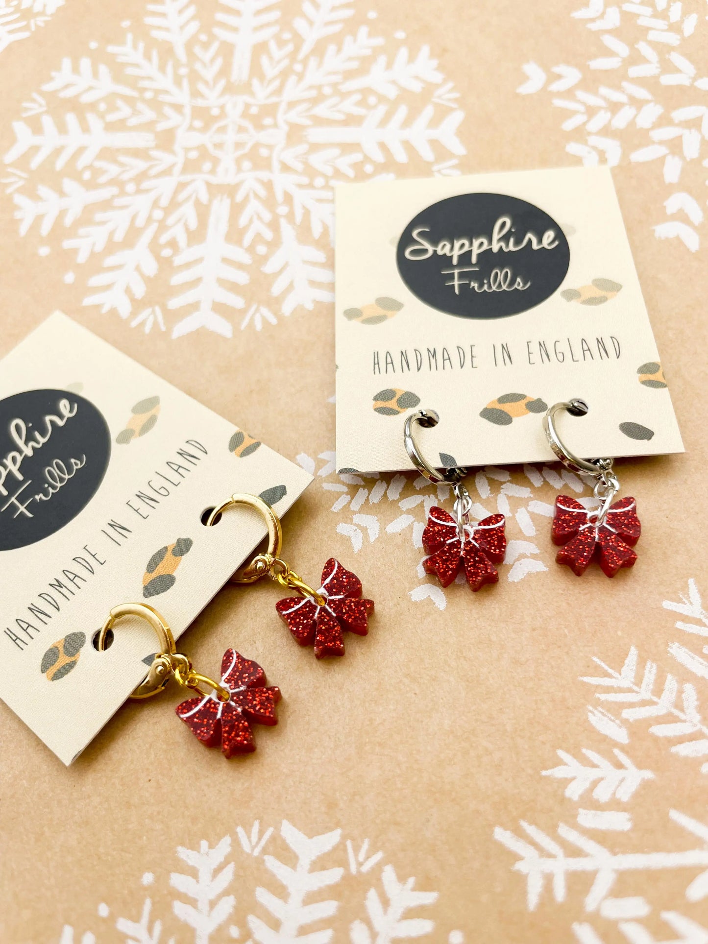 Mini Red Glitter Acrylic Xmas Bow Dangle Earrings from Sapphire Frills
