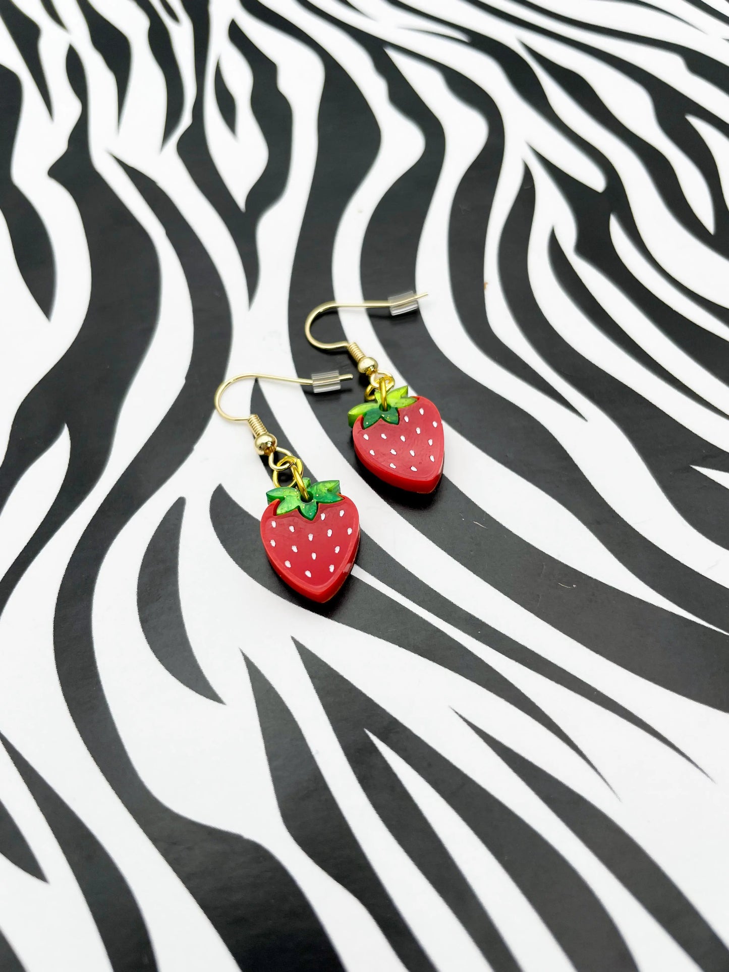 Small Green Glitter Marble and Red Gloss Acrylic Strawberry Dangle Earrings from Sapphire Frills