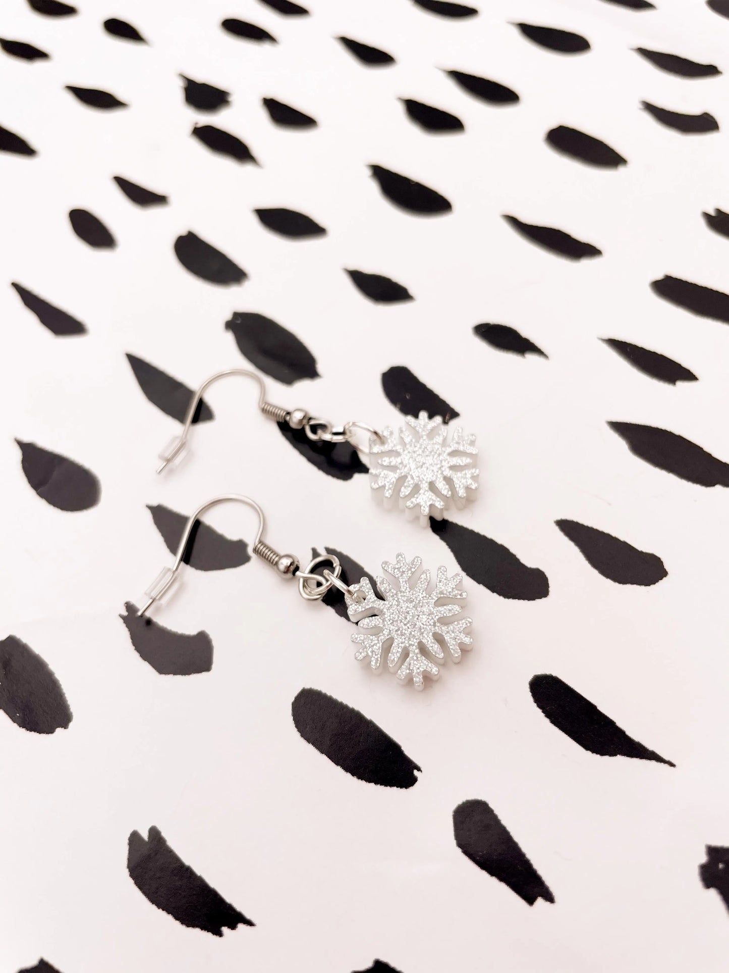 Small Silver Glitter Acrylic Snowflake Dangle Earrings from Sapphire Frills
