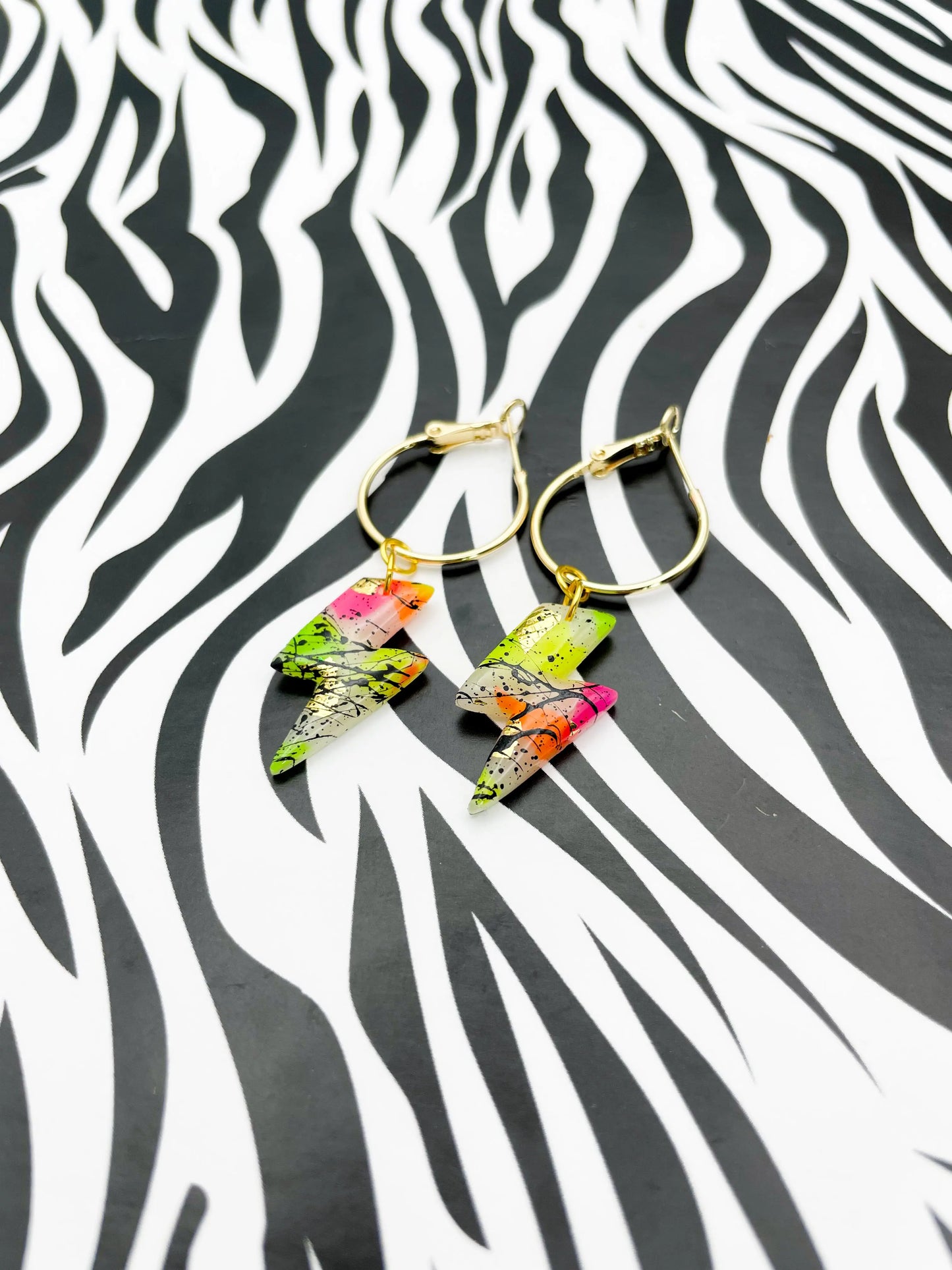 Translucent Neon and Gold Foil Black Splatter Small Lightning Bolt Dangles from Sapphire Frills