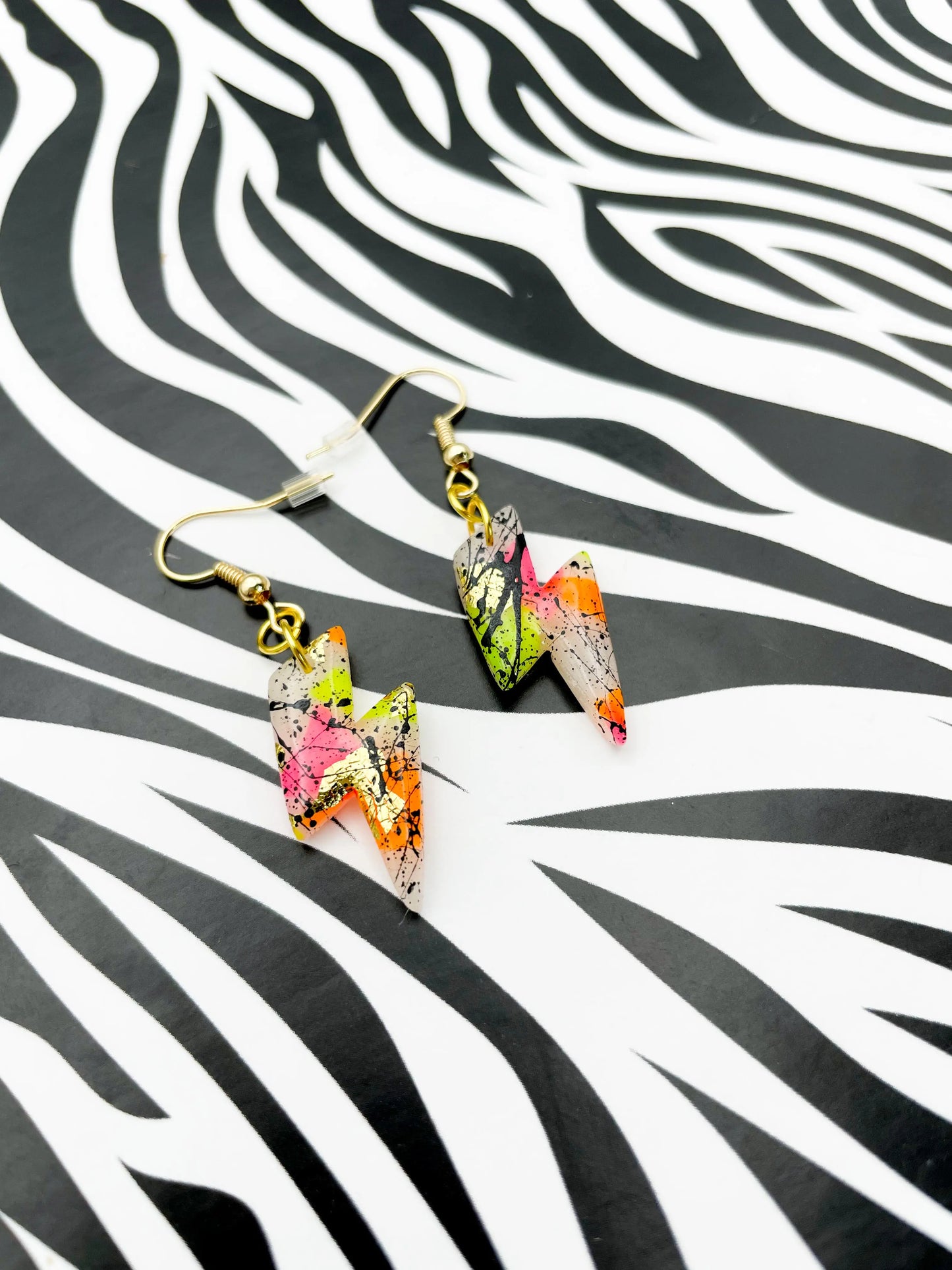 Translucent Neon and Gold Foil Black Splatter Small Lightning Bolt Dangles from Sapphire Frills