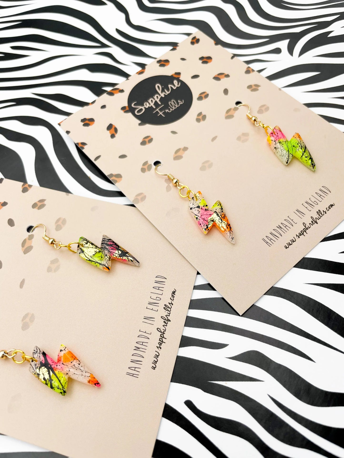 Translucent Neon and Gold Foil Black Splatter Small Lightning Bolt Dangles from Sapphire Frills