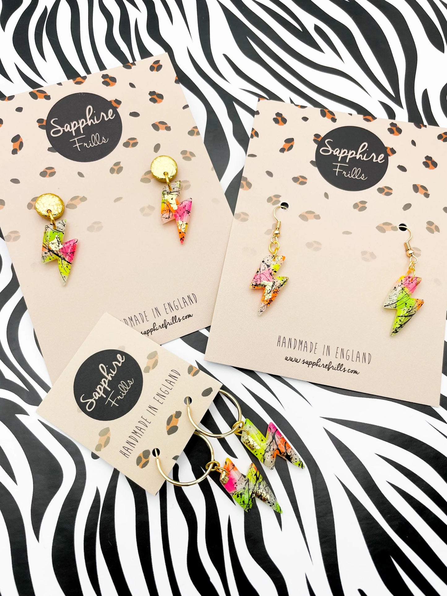 Translucent Neon and Gold Foil Black Splatter Small Lightning Bolt Dangles from Sapphire Frills