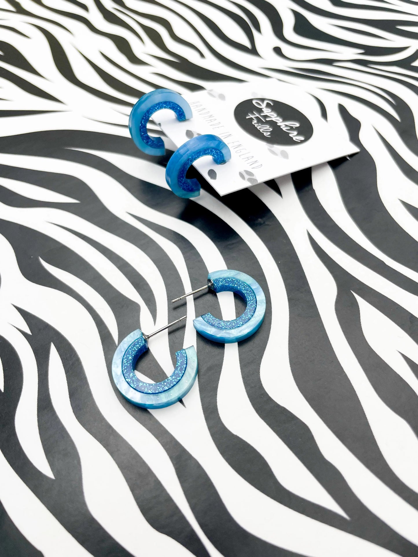 Baby Blue Marble and Blue Glitter Striped Acrylic Hoops from Sapphire Frills