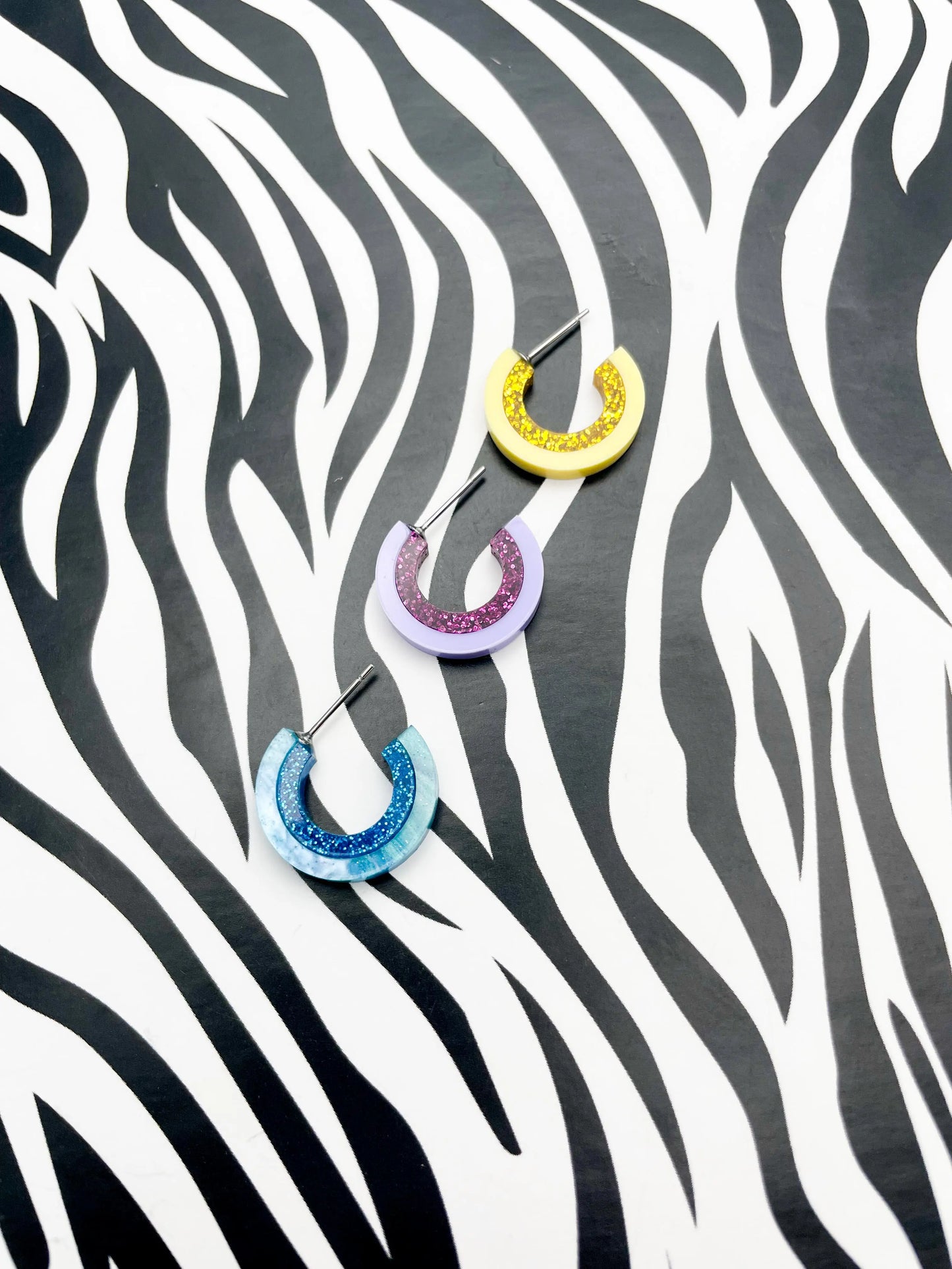 Baby Blue Marble and Blue Glitter Striped Acrylic Hoops from Sapphire Frills
