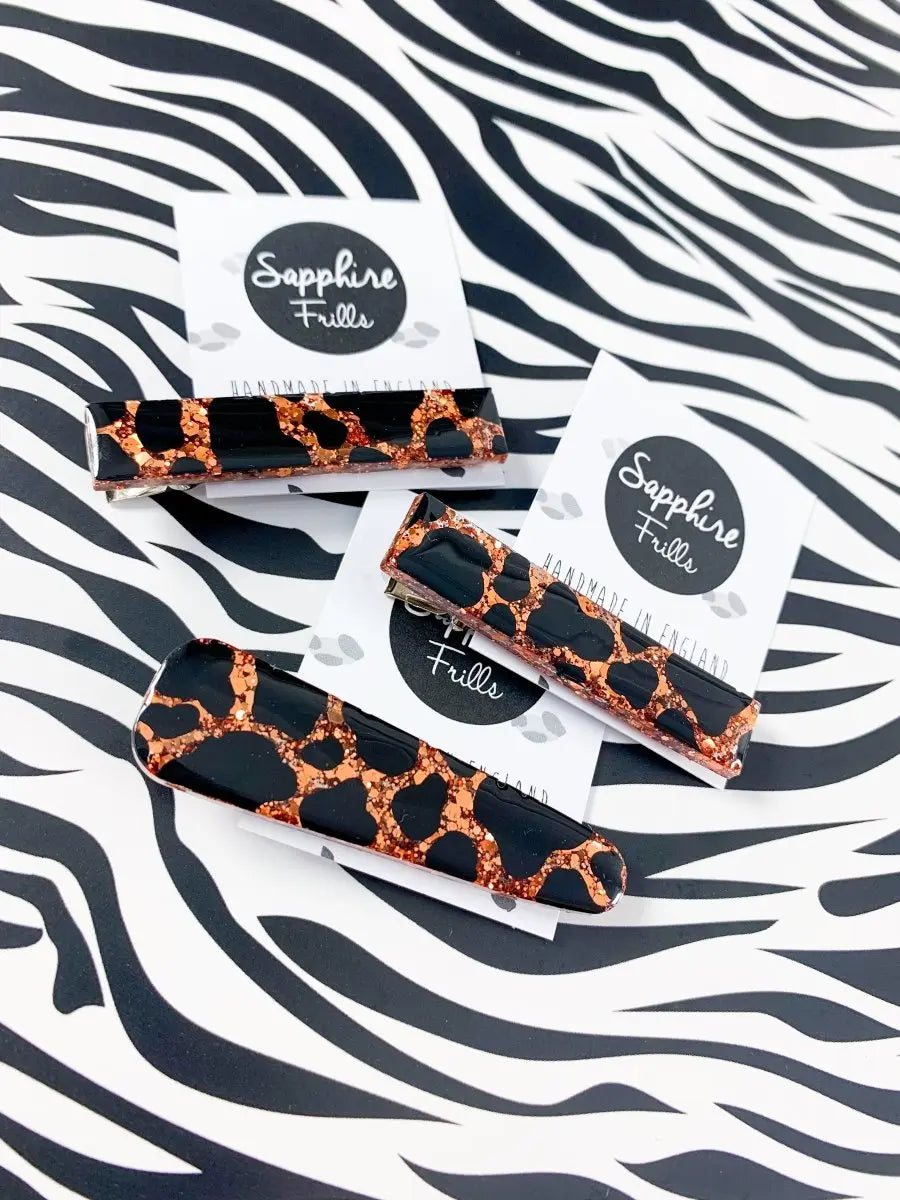 Copper Glitter Cow Print Hair Clips from Sapphire Frills