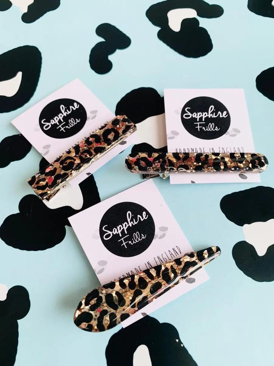 Gold Glitter Leopard Print Hair Clips from Sapphire Frills