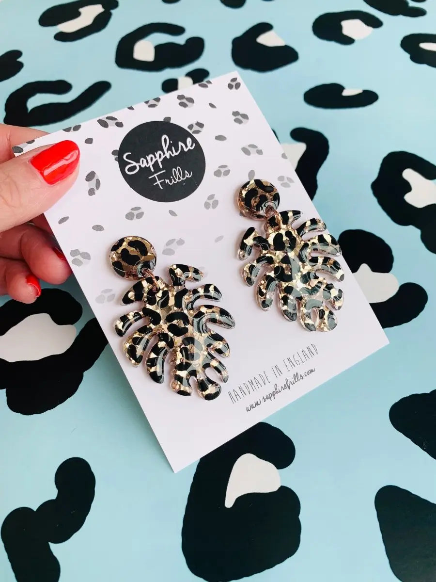 Gold Glitter Leopard Print Monstera Leaf Dangle Earrings from Sapphire Frills