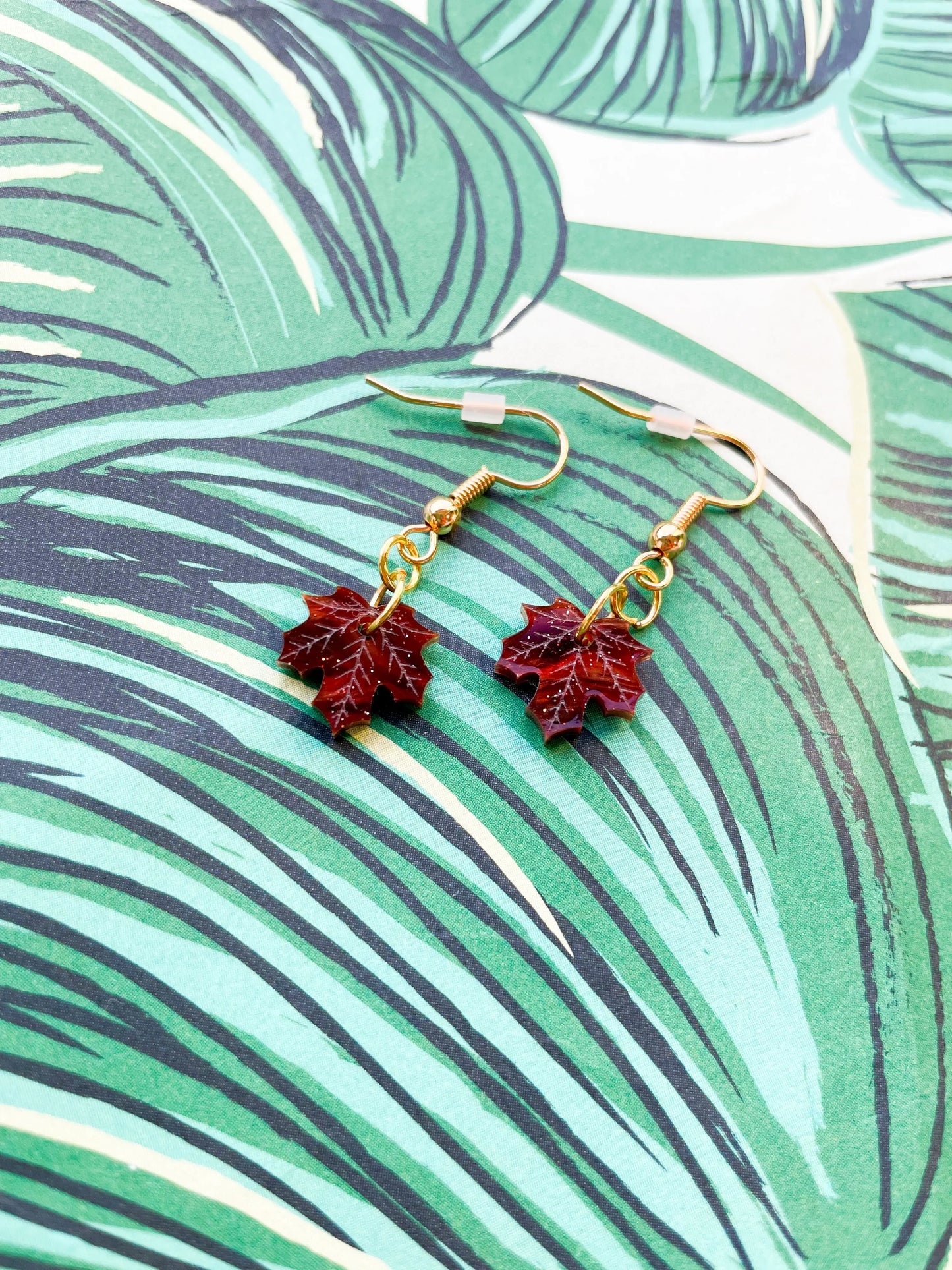 Mini Maroon Glitter Marble Acrylic Maple Leaf Dangle Earrings from Sapphire Frills