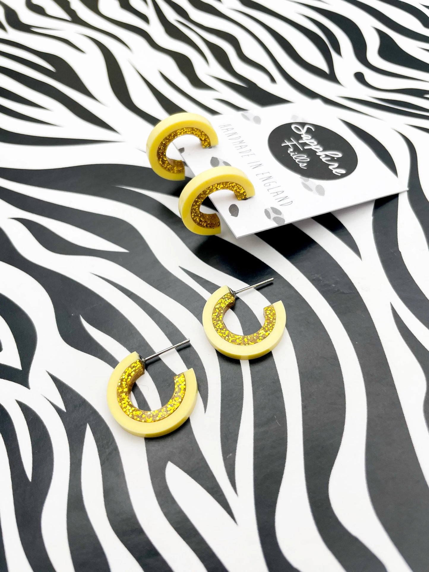 Pastel Yellow and Gold Glitter Striped Acrylic Hoops from Sapphire Frills