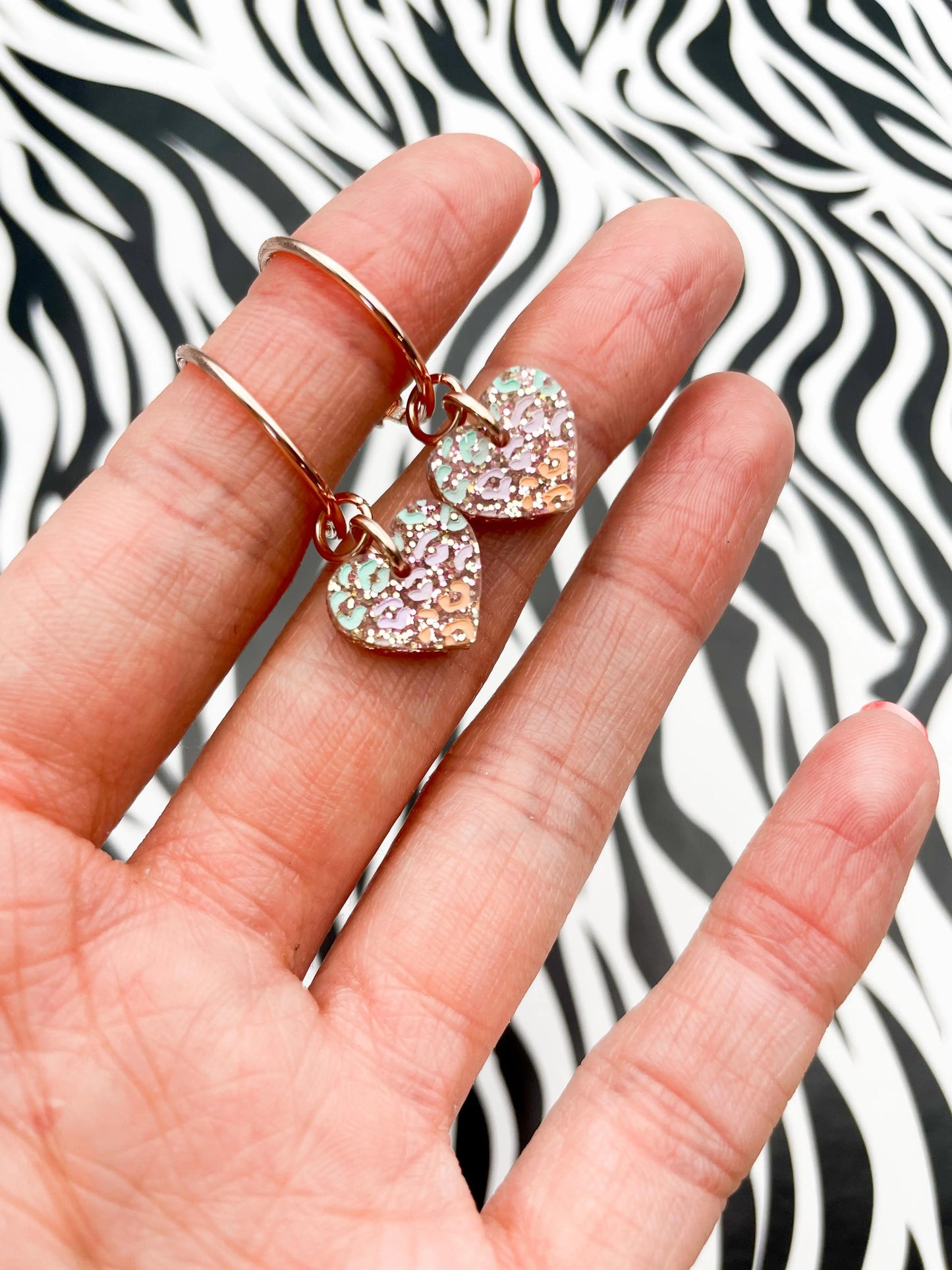 Small Rose Glitter, Mint, Lilac and Peach Leopard Print Acrylic Heart Dangle Earrings from Sapphire Frills