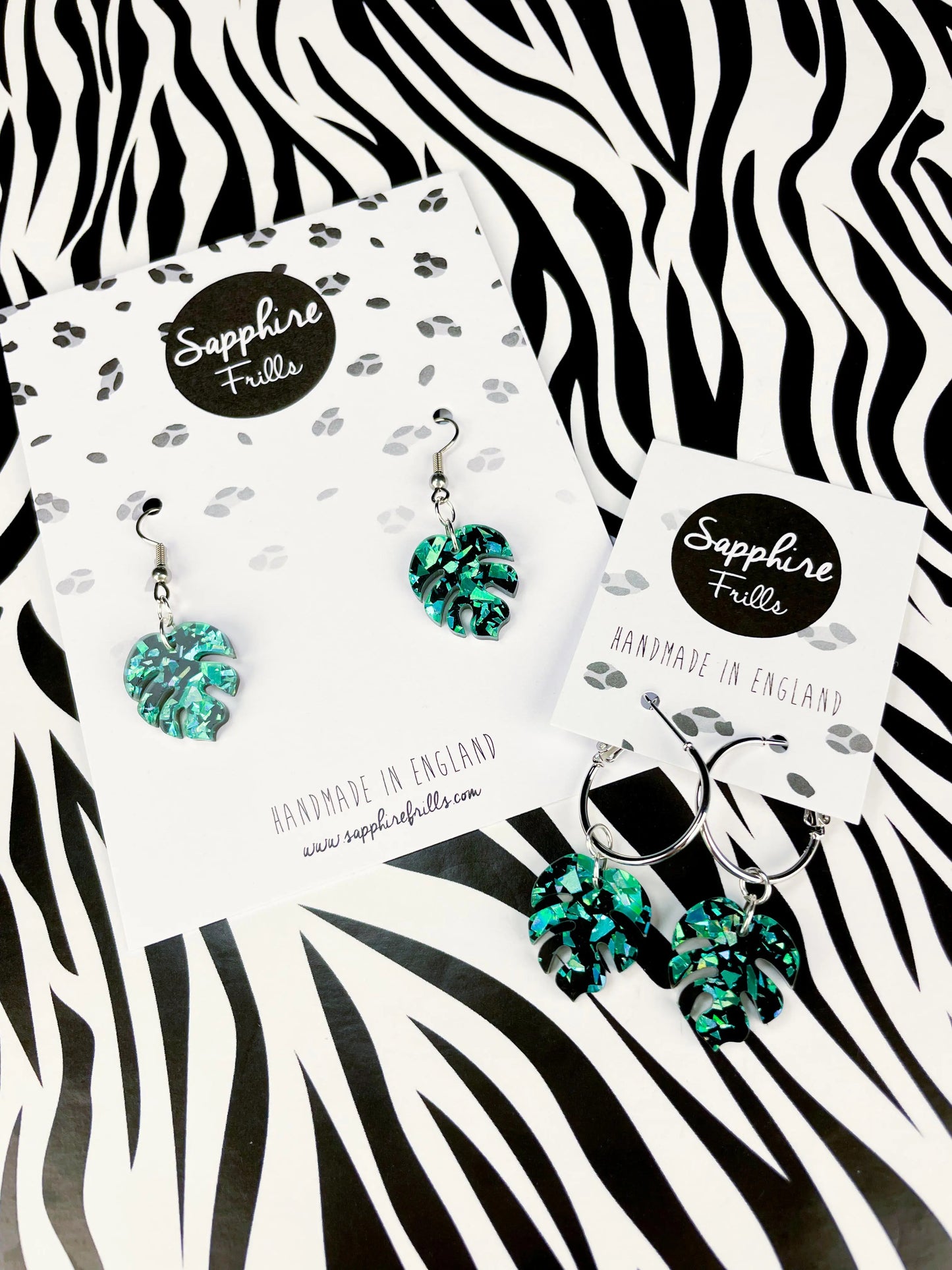 Small Teal Chunky Crystal Glitter Acrylic Monstera Leaf Dangle Earrings from Sapphire Frills