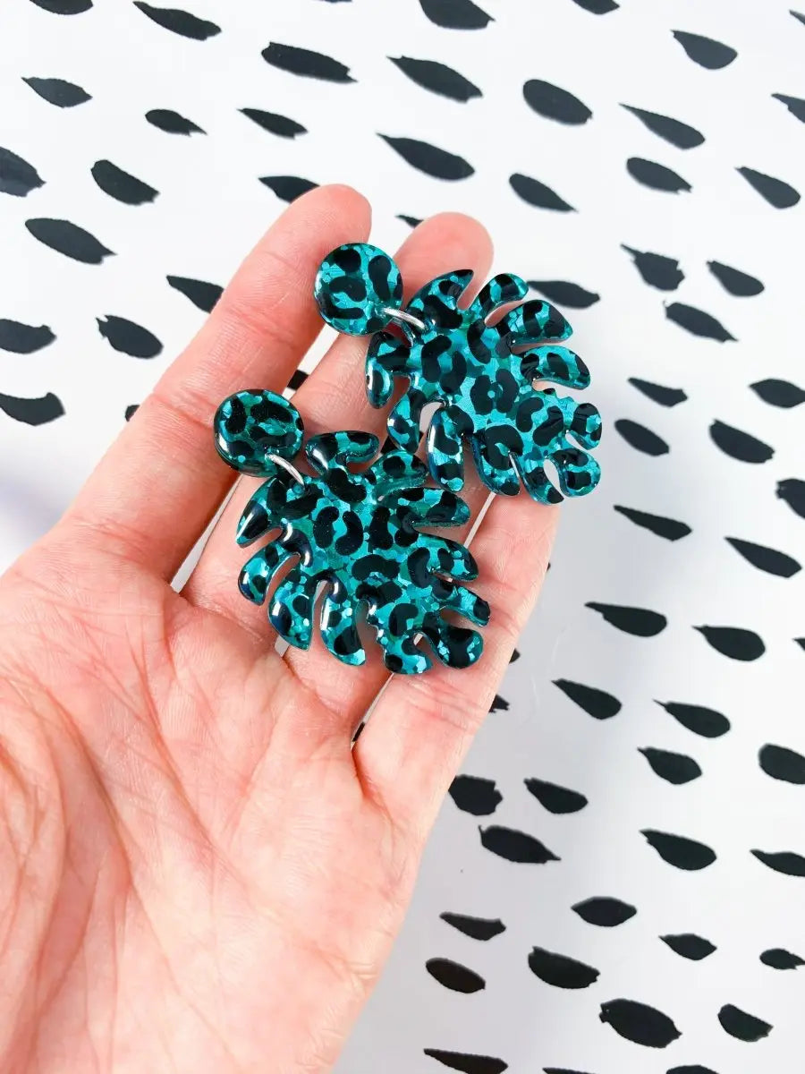 Teal Glitter Leopard Print Monstera Leaf Dangle Earrings from Sapphire Frills