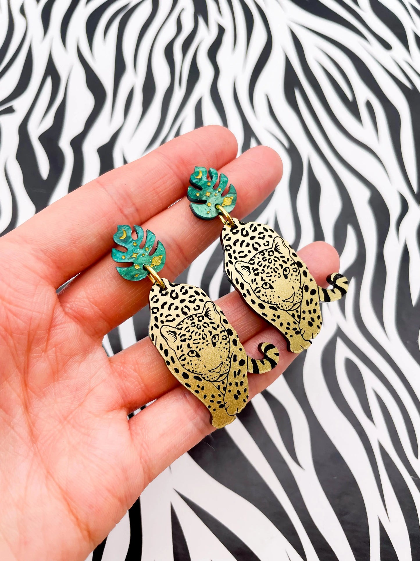Green Galaxy Glitter Marble and Gold Acrylic Leopard Monstera Leaf Dangle Earrings from Sapphire Frills