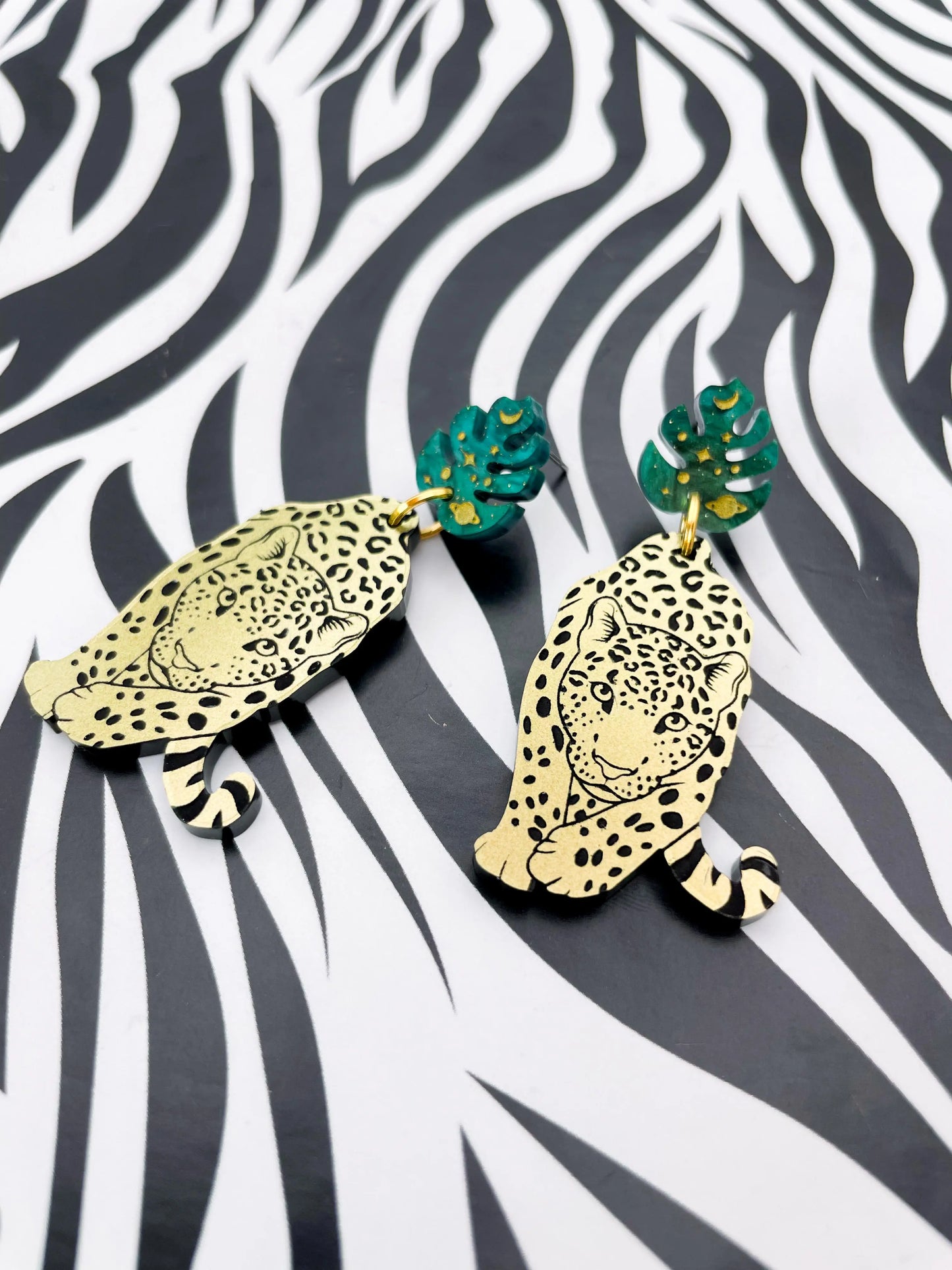 Green Galaxy Glitter Marble and Gold Acrylic Leopard Monstera Leaf Dangle Earrings from Sapphire Frills