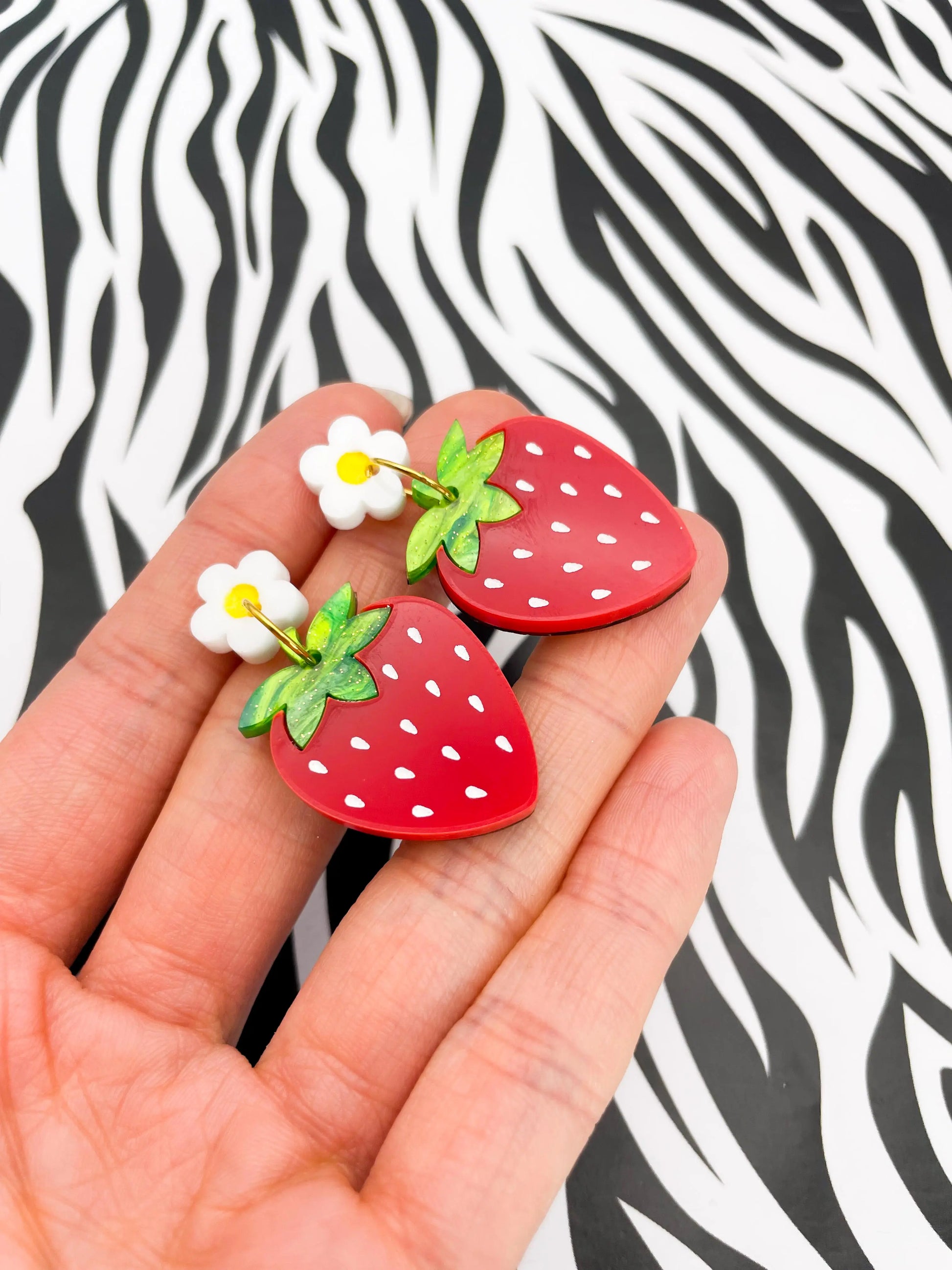Green Glitter Marble and Red Gloss Acrylic Strawberry Flower Dangle Earrings from Sapphire Frills