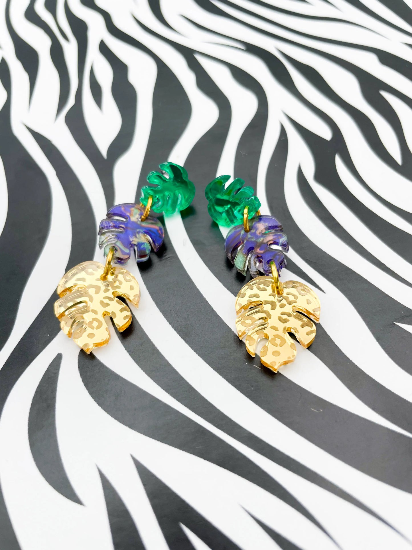 Green, Jungle Blue & Gold Leopard Acrylic Mirror Monstera Leaf Dangle Earrings from Sapphire Frills