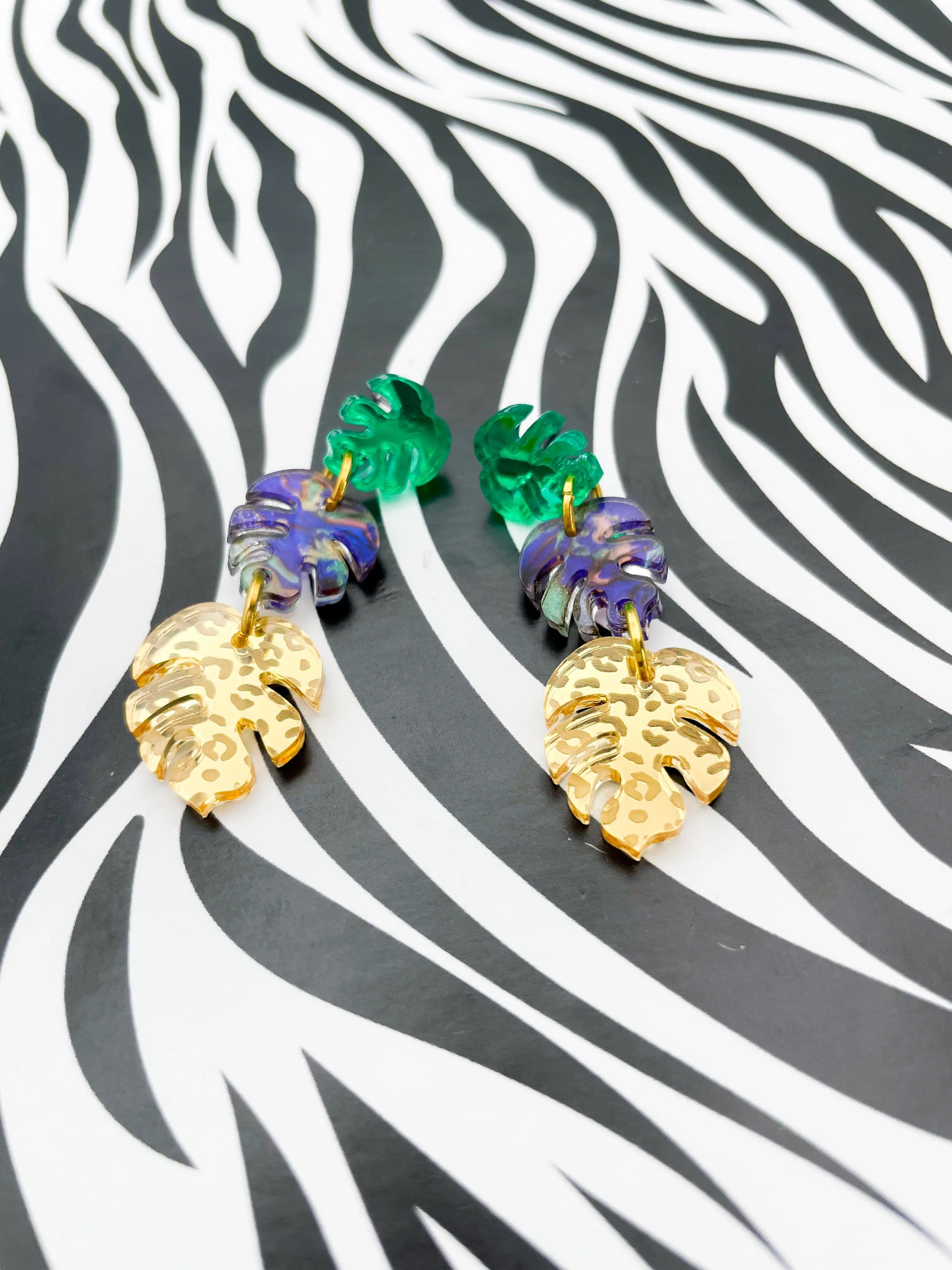 Green, Jungle Blue & Gold Leopard Acrylic Mirror Monstera Leaf Dangle Earrings from Sapphire Frills