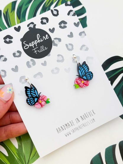 Medium Blue Butterfly on Hot Pink Flower Dangle Earrings or Necklace – Hypoallergenic Stainless Steel