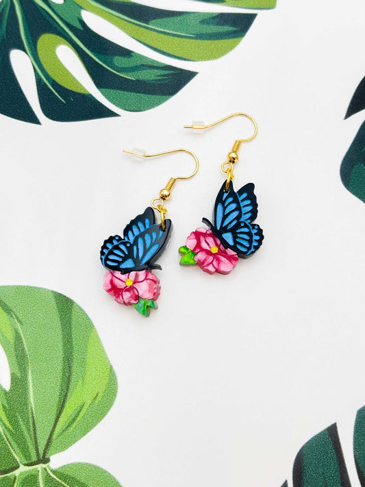 Medium Blue Butterfly on Hot Pink Flower Dangle Earrings or Necklace – Hypoallergenic Stainless Steel