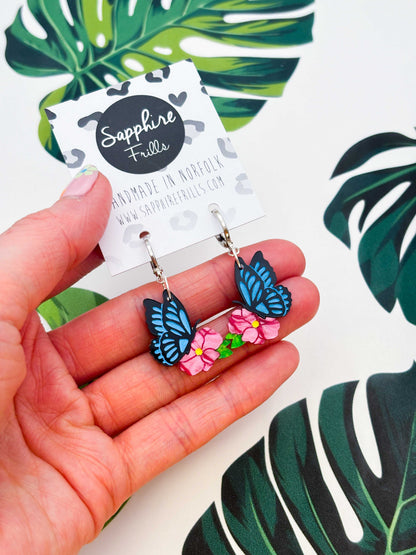 Medium Blue Butterfly on Hot Pink Flower Dangle Earrings or Necklace – Hypoallergenic Stainless Steel