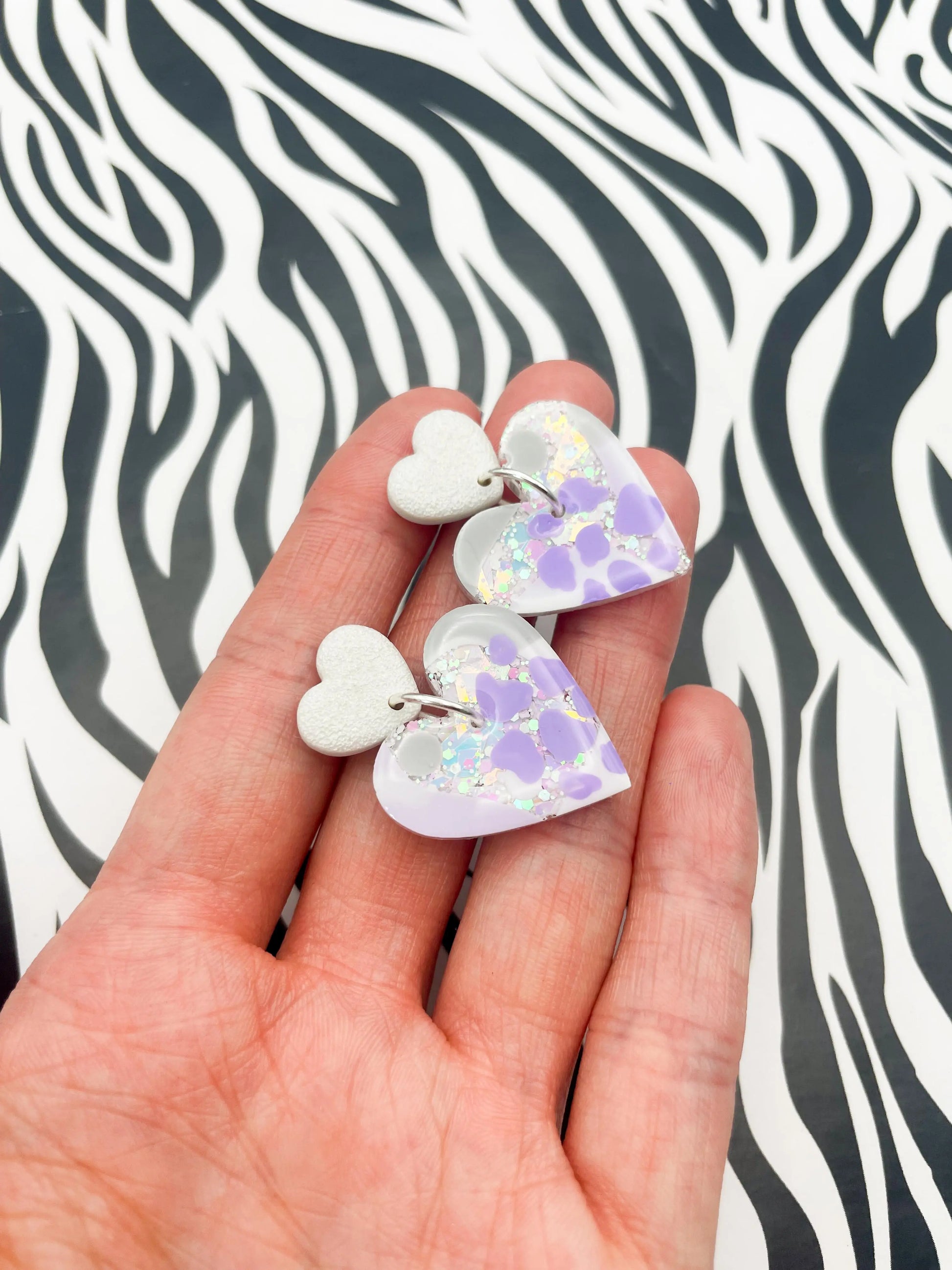 Iridescent and Lilac Cow Print Mosaic Glitter Resin Heart Dangle Earrings from Sapphire Frills
