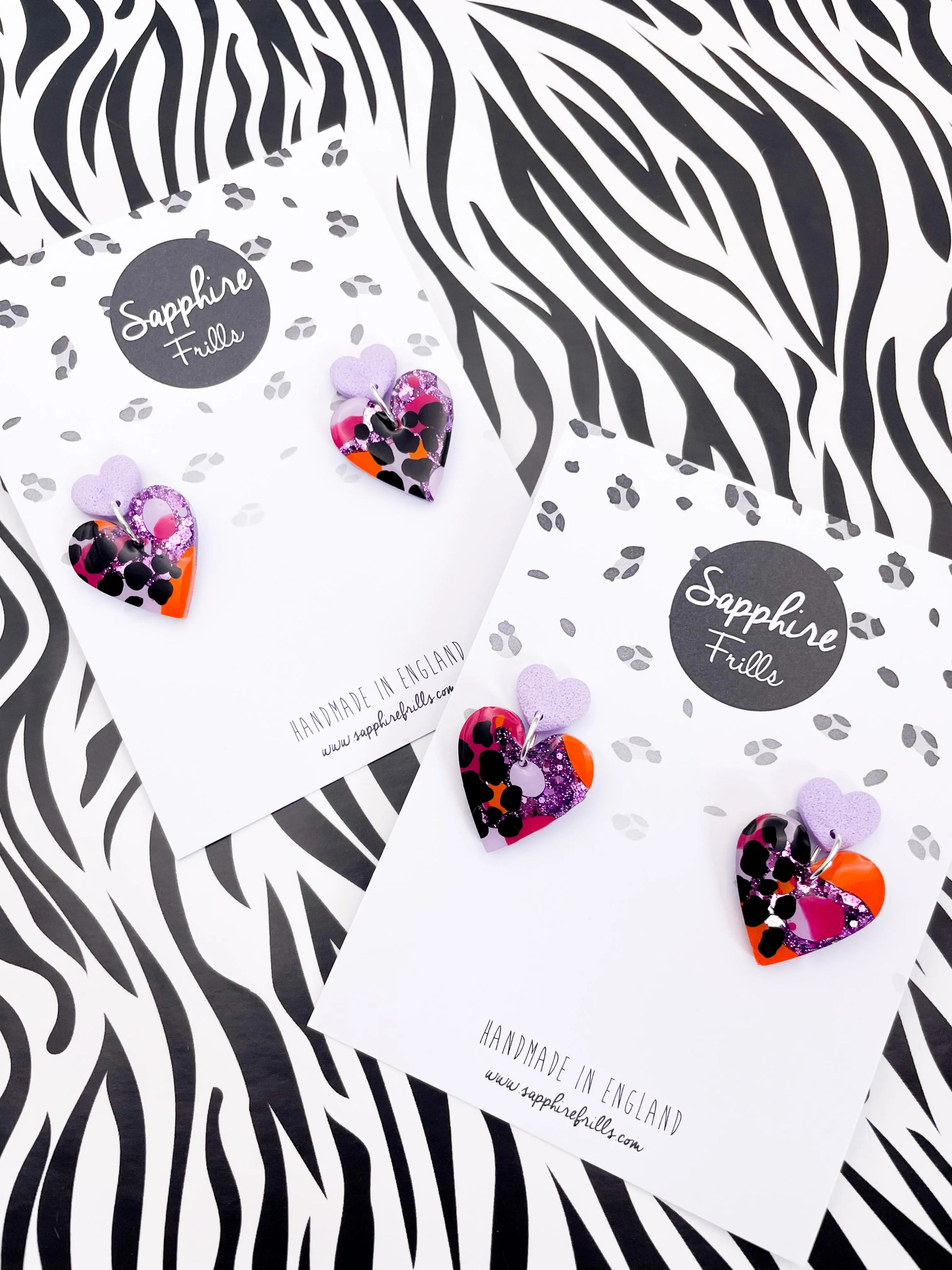 Lilac, Orange and Hot Pink Giraffe Print Glitter Resin Heart Dangle Earrings from Sapphire Frills