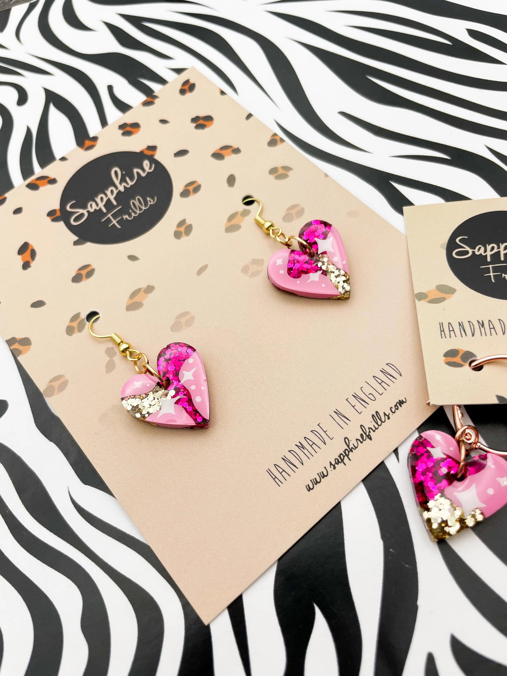Medium Hot Pink and Gold Glitter Star Print Resin Heart Earrings from Sapphire Frills