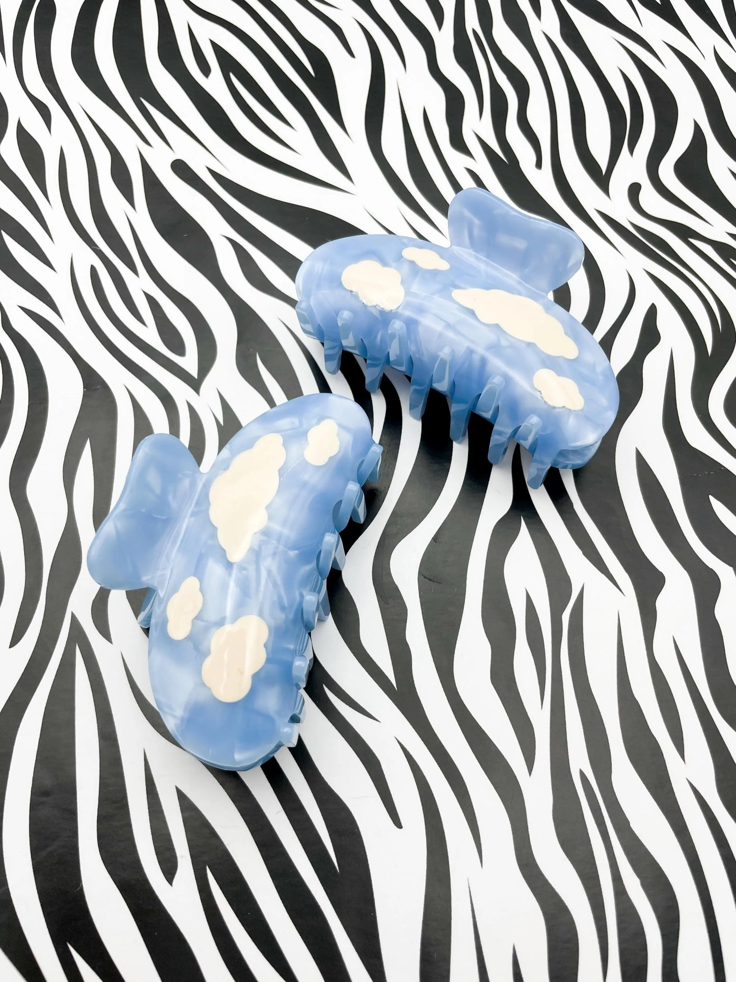 Medium Metallic Sky Blue Cloud Print Claw Hair Clip from Sapphire Frills
