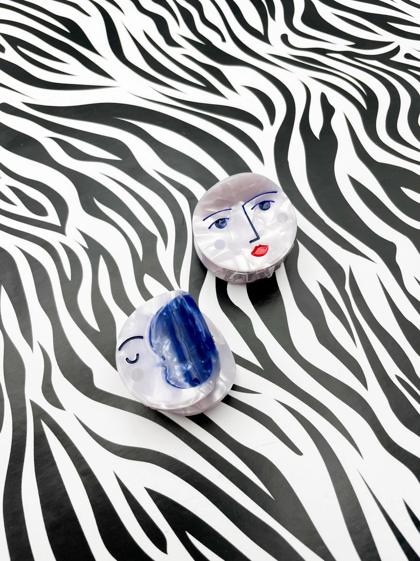 Mini Metallic White and Navy Moon and Face Claw Hair Clip from Sapphire Frills
