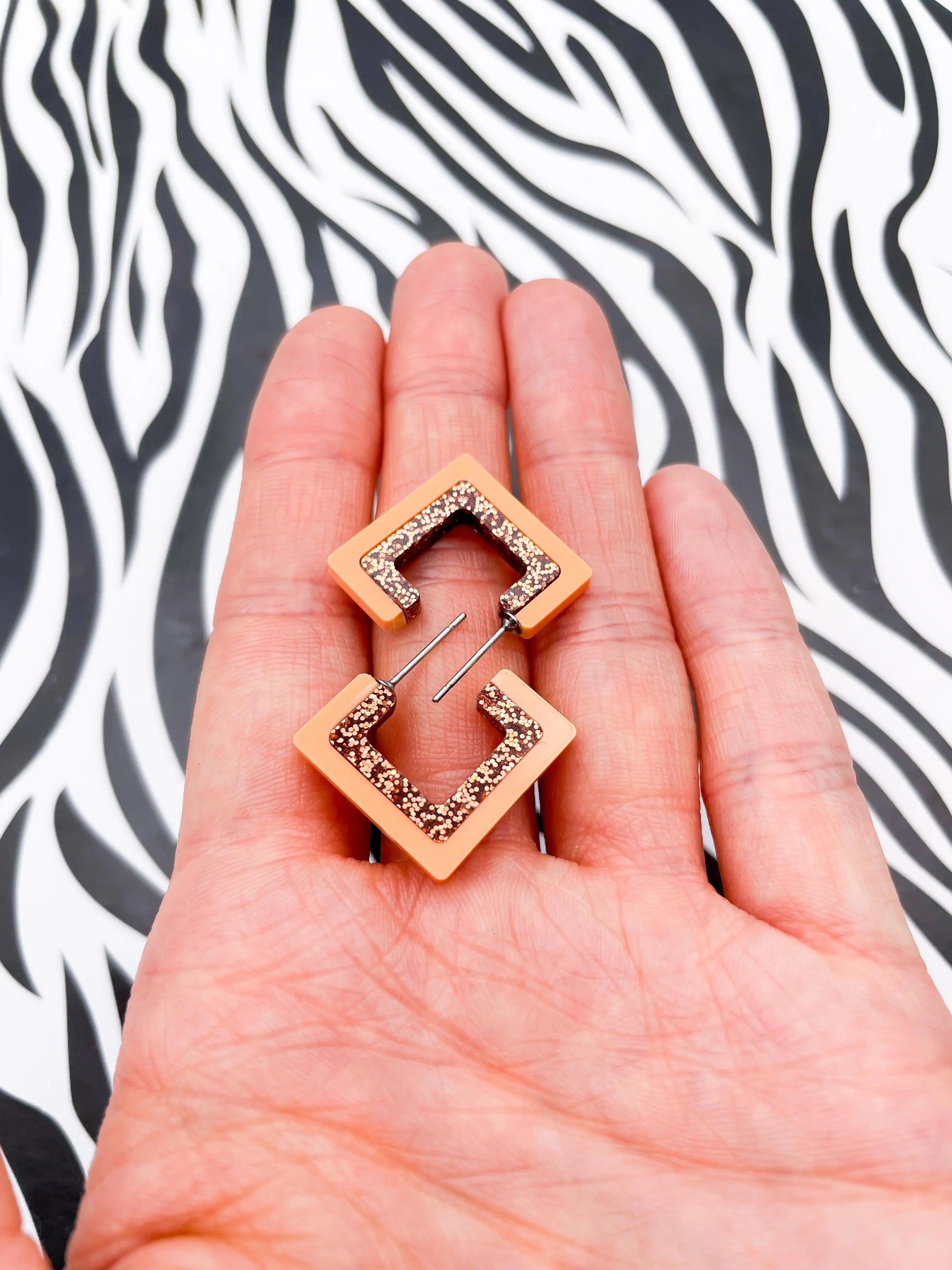 Peach and Copper Glitter Striped Acrylic Square Hoops from Sapphire Frills