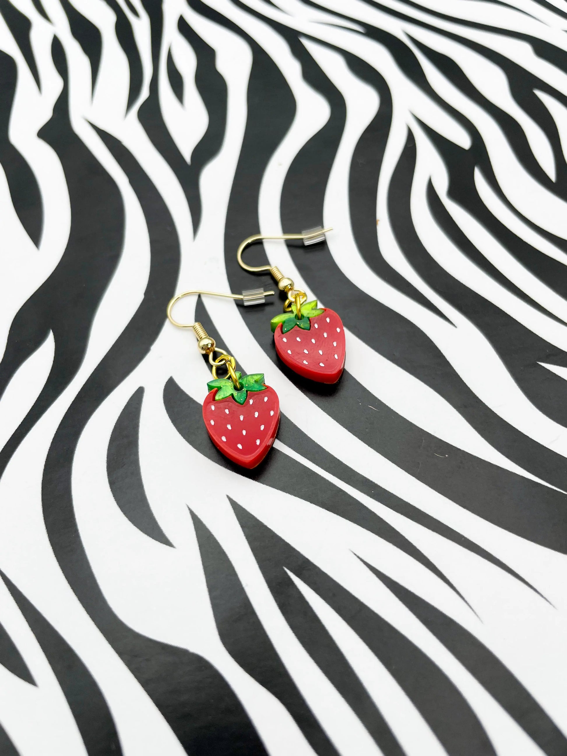 Small Green Glitter Marble and Red Gloss Acrylic Strawberry Dangle Earrings from Sapphire Frills