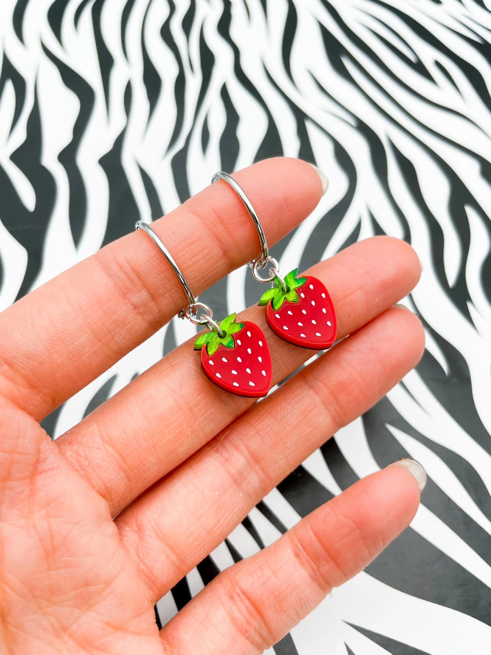 Small Green Glitter Marble and Red Gloss Acrylic Strawberry Dangle Earrings from Sapphire Frills