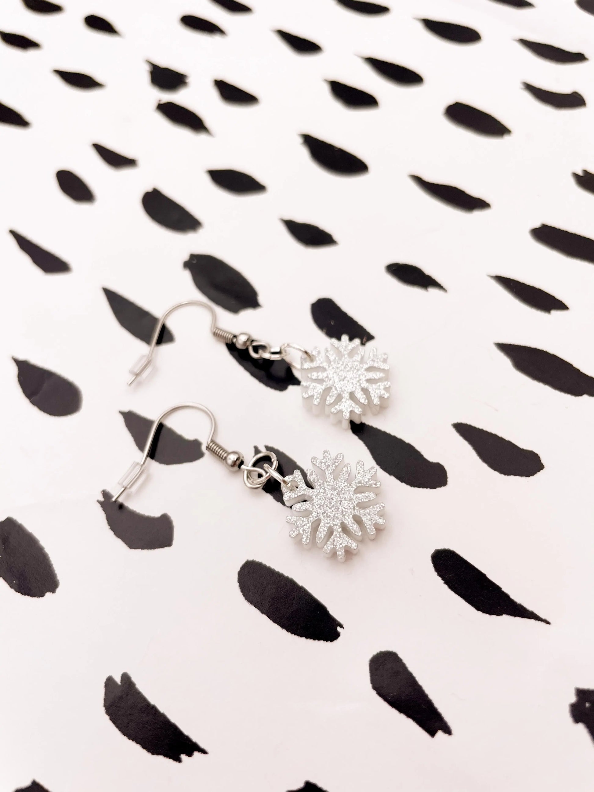 Small Silver Glitter Acrylic Snowflake Dangle Earrings from Sapphire Frills