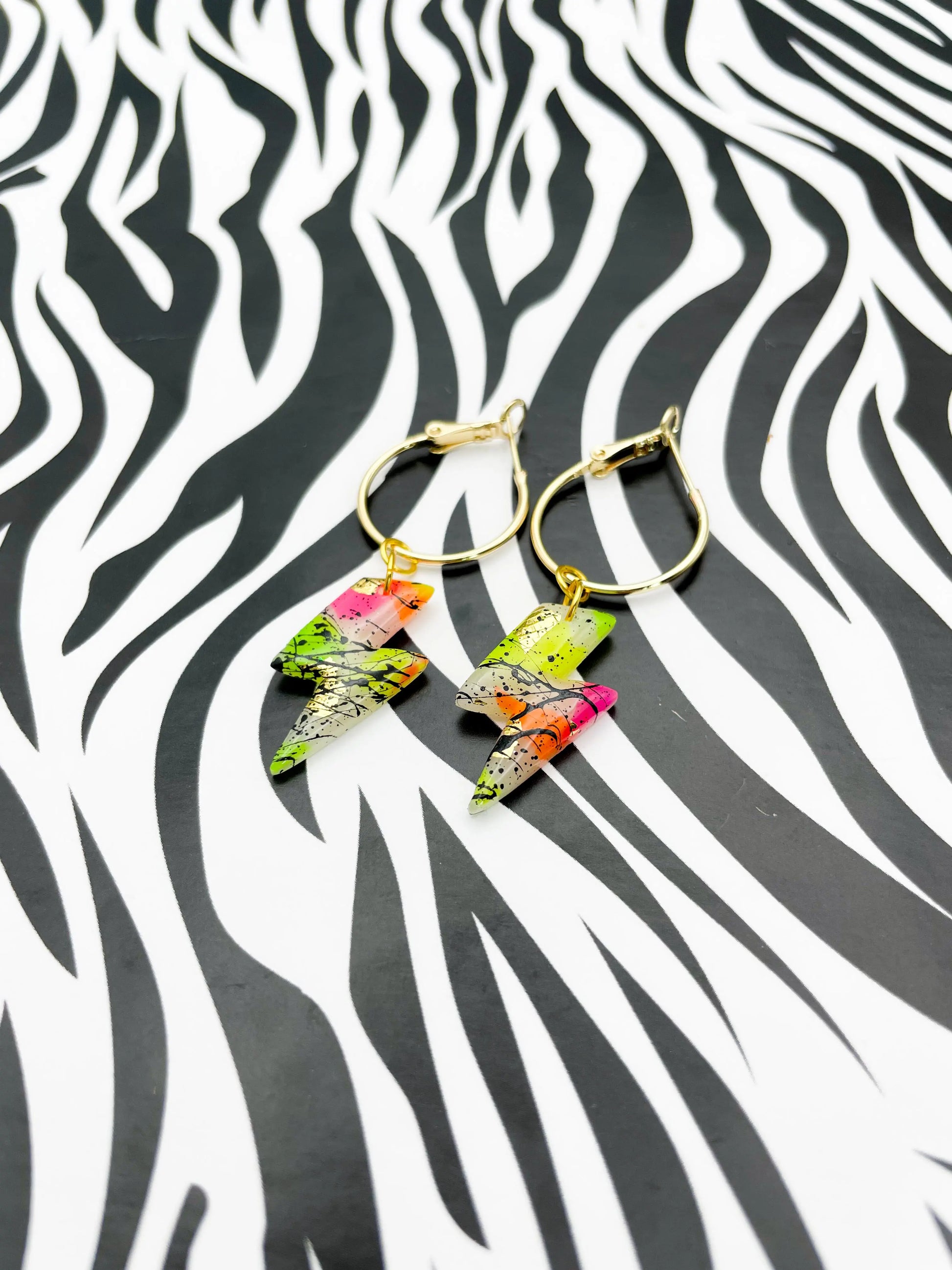 Translucent Neon and Gold Foil Black Splatter Small Lightning Bolt Dangles from Sapphire Frills