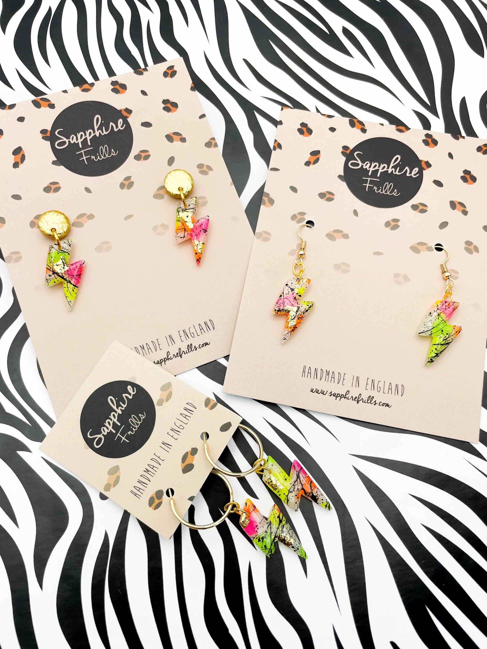 Translucent Neon and Gold Foil Black Splatter Small Lightning Bolt Dangles from Sapphire Frills