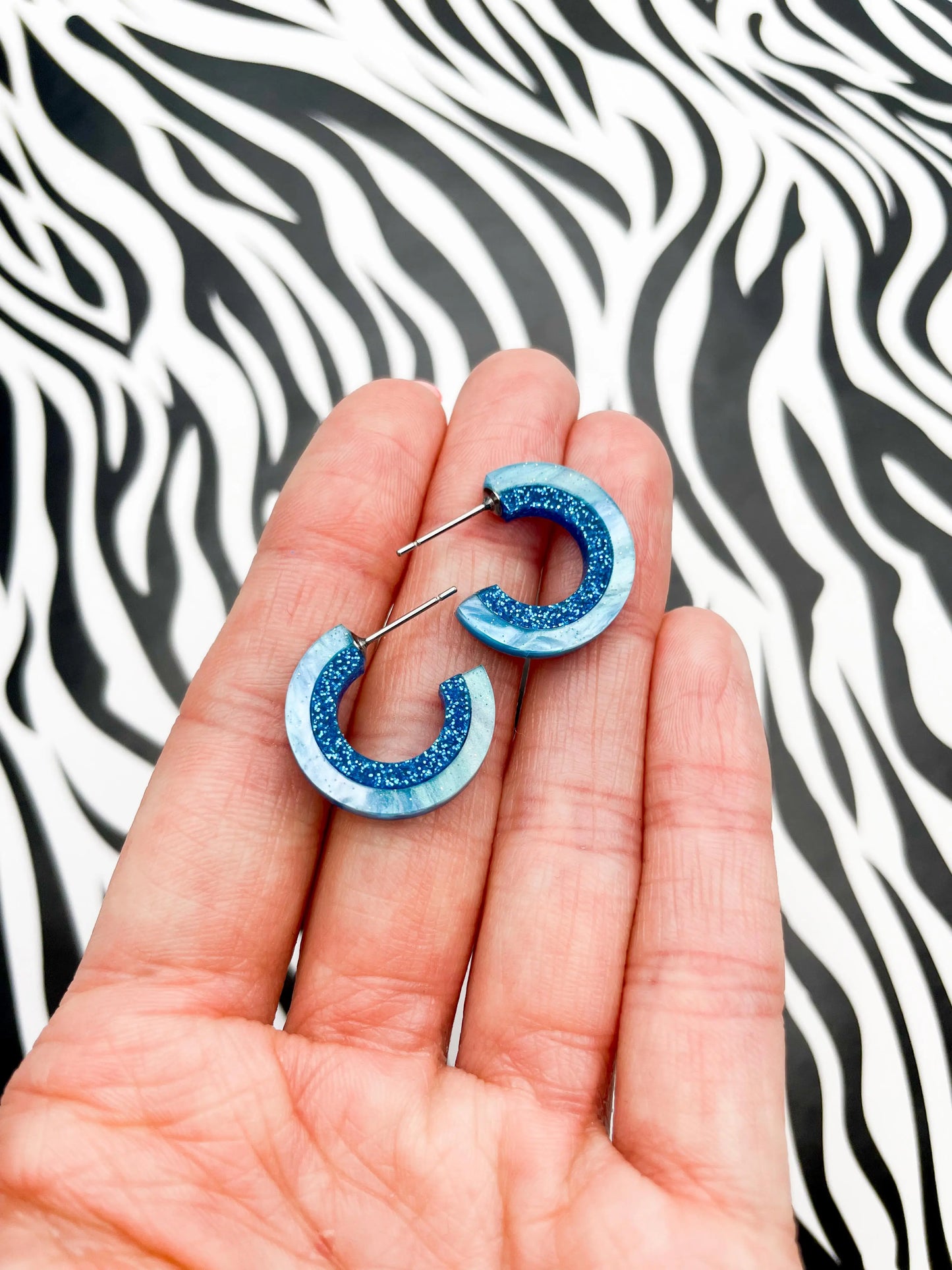 Baby Blue Marble and Blue Glitter Striped Acrylic Hoops from Sapphire Frills