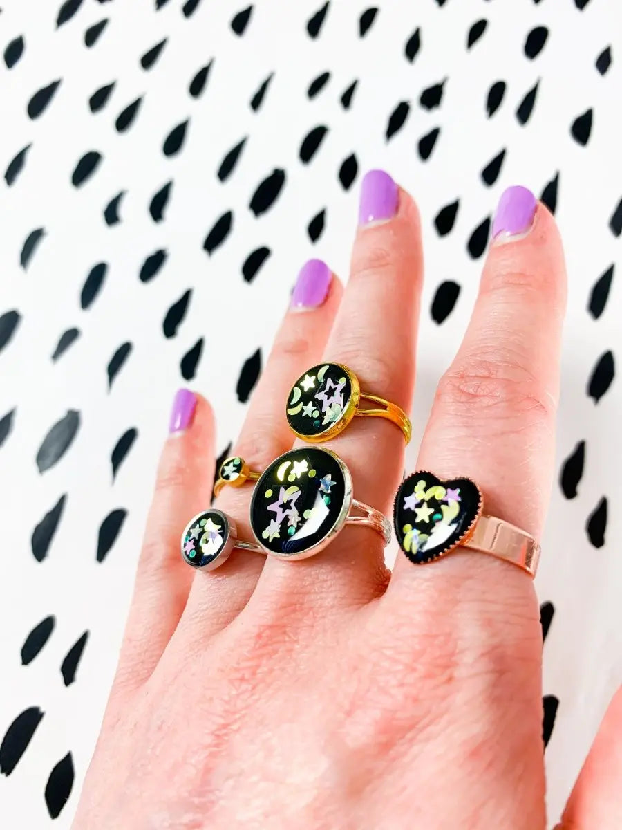 Black with White Florescent Star and Moon Sequins Adjustable Ring from Sapphire Frills
