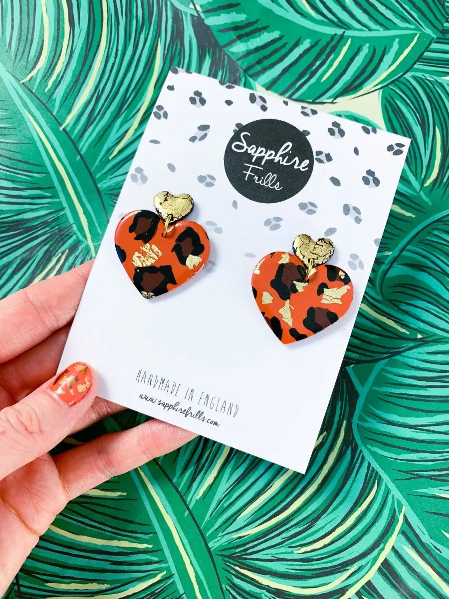 Burnt Orange Leopard Print Heart Dangle Earrings from Sapphire Frills