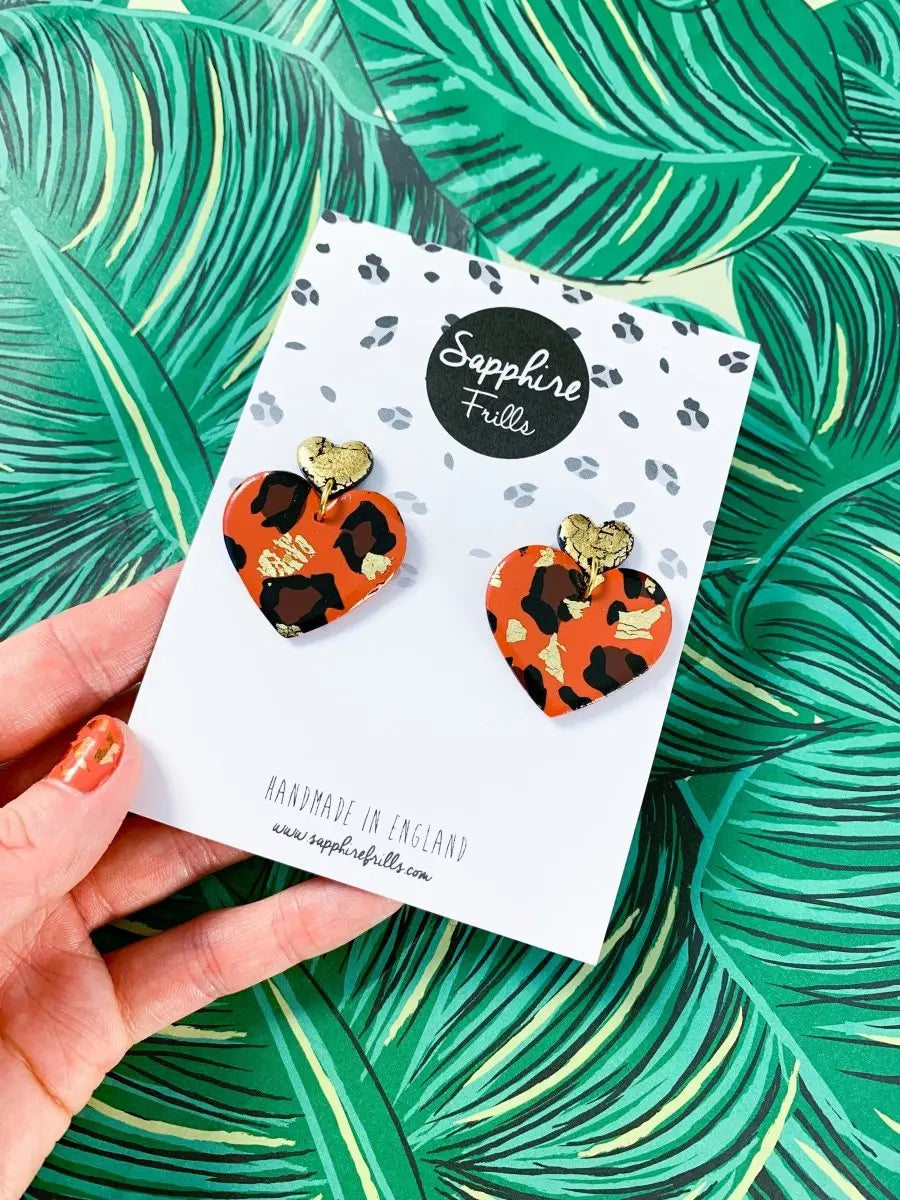 Burnt Orange Leopard Print Heart Dangle Earrings from Sapphire Frills