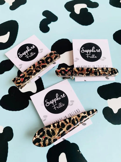 Gold Glitter Leopard Print Hair Clips from Sapphire Frills